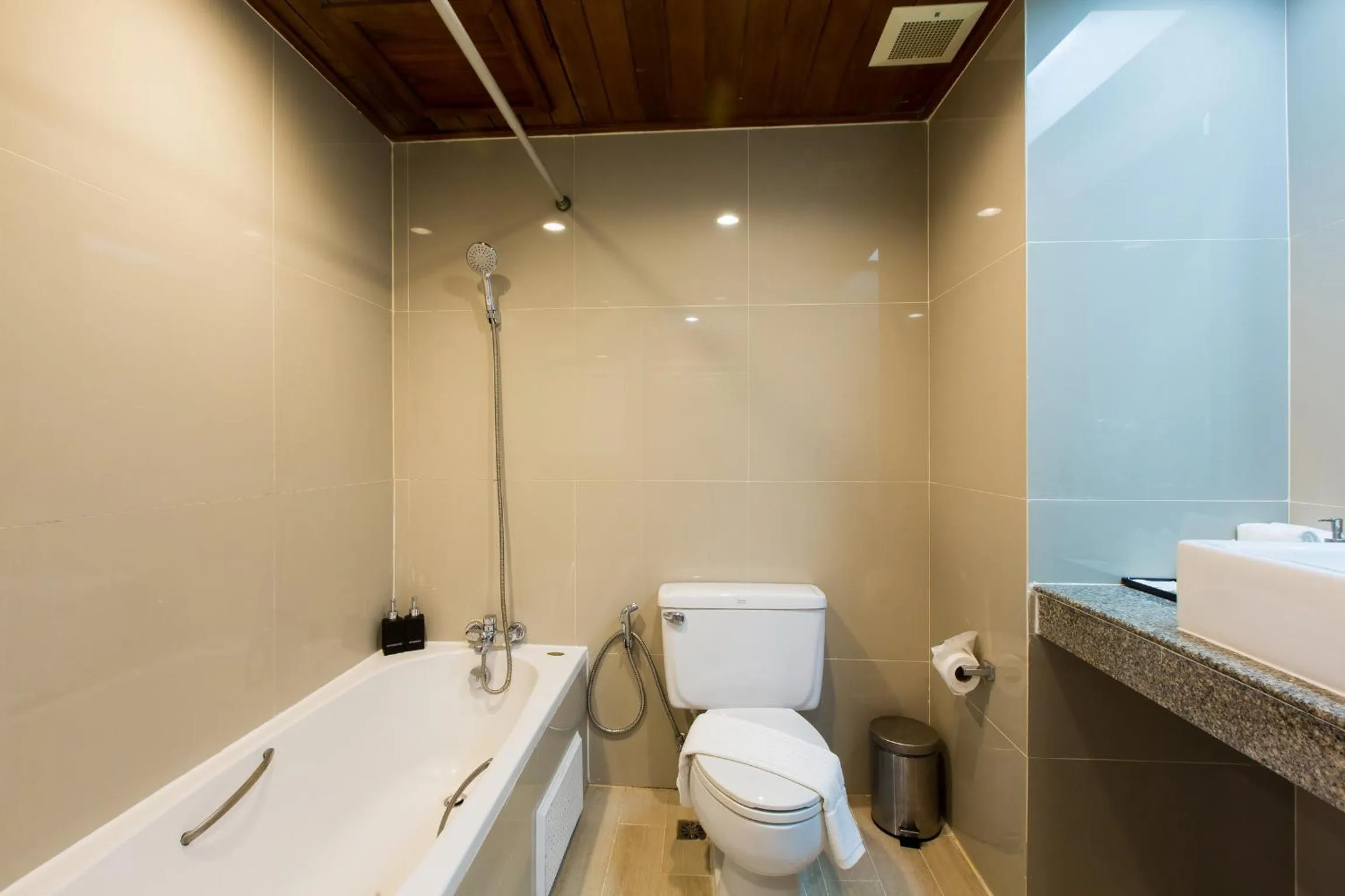 Toilet in Coconut Village Resort Phuket - SHA Extra Plus