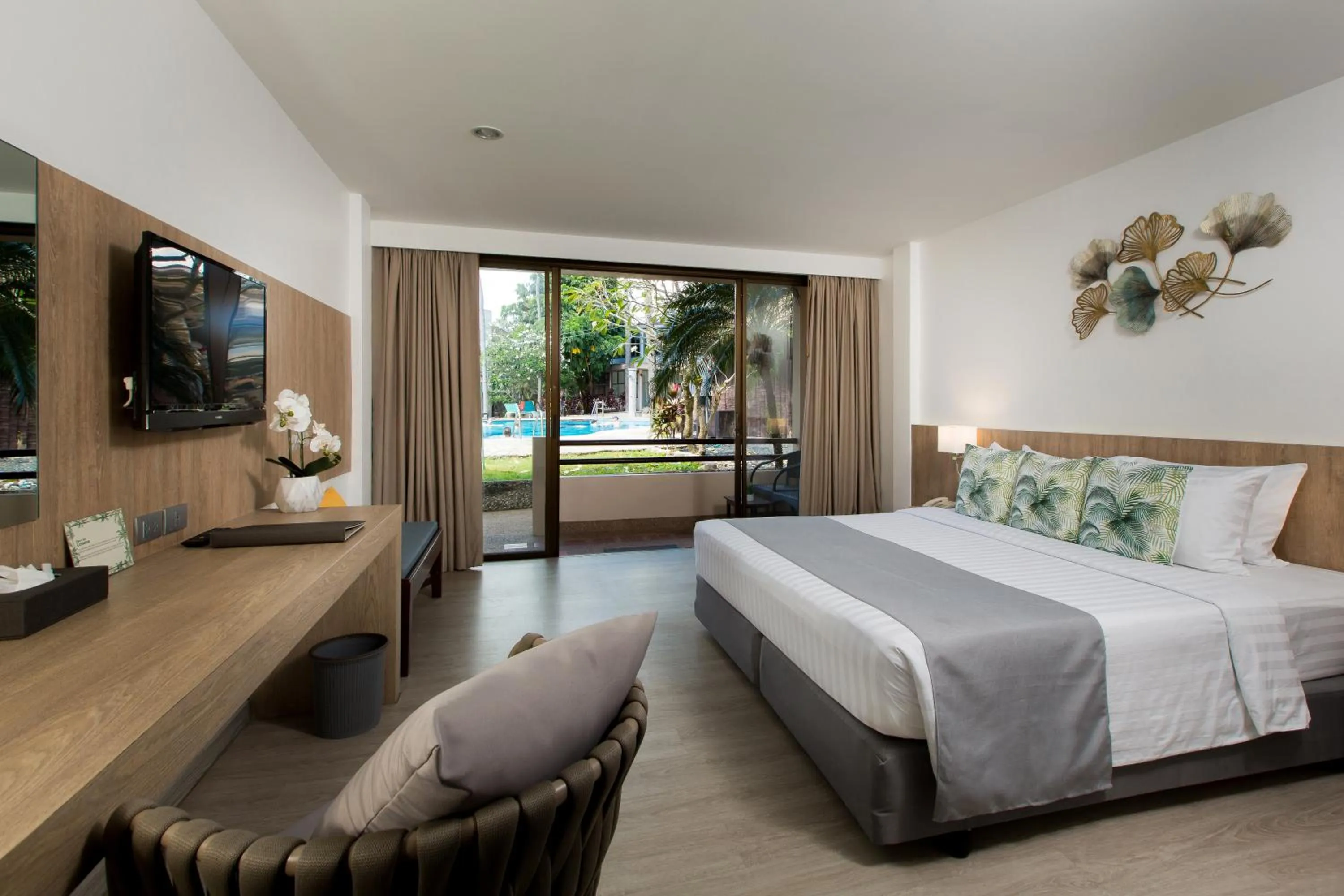 Photo of the whole room, Bed in Coconut Village Resort Phuket - SHA Extra Plus