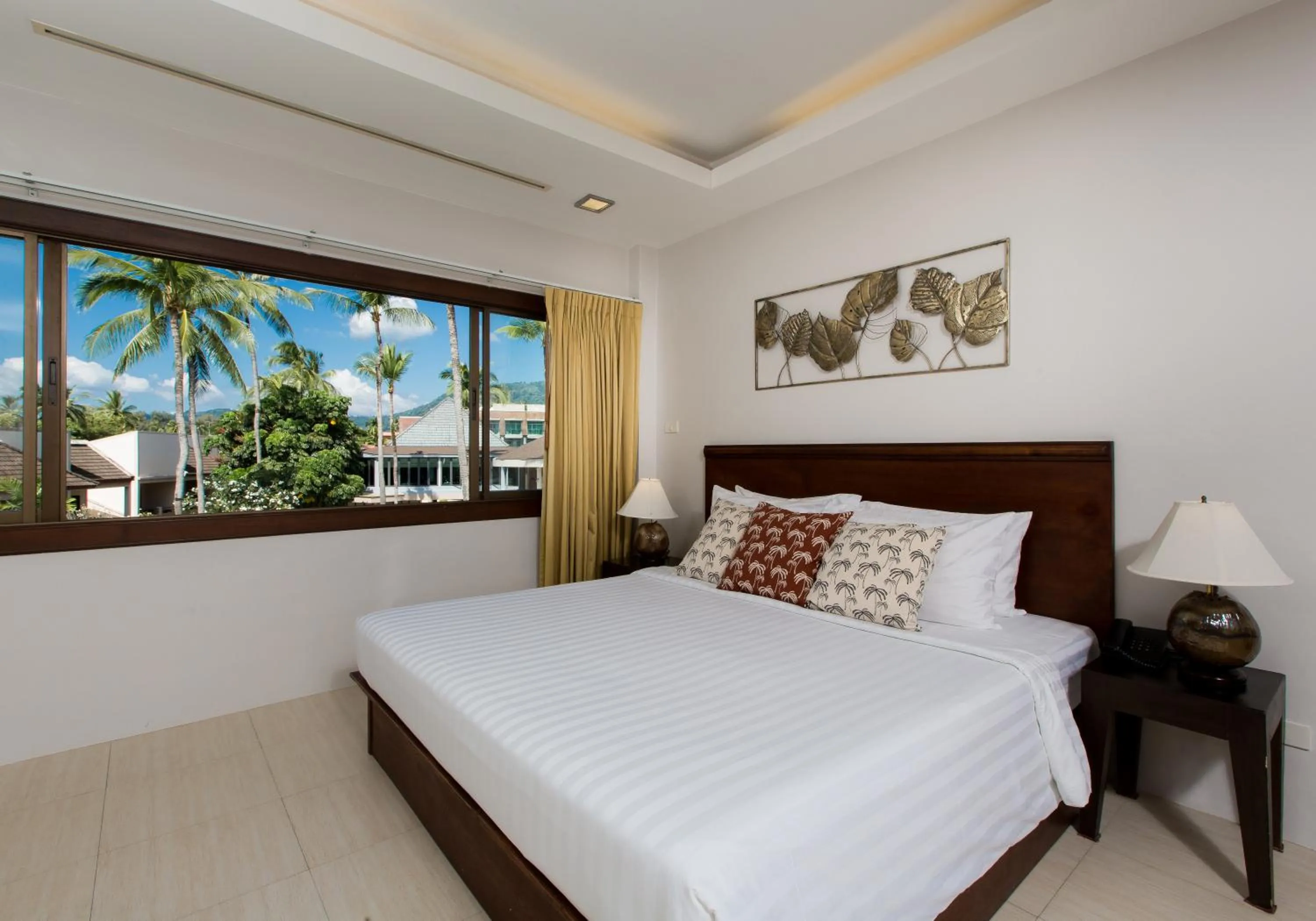 Bed in Coconut Village Resort Phuket - SHA Extra Plus