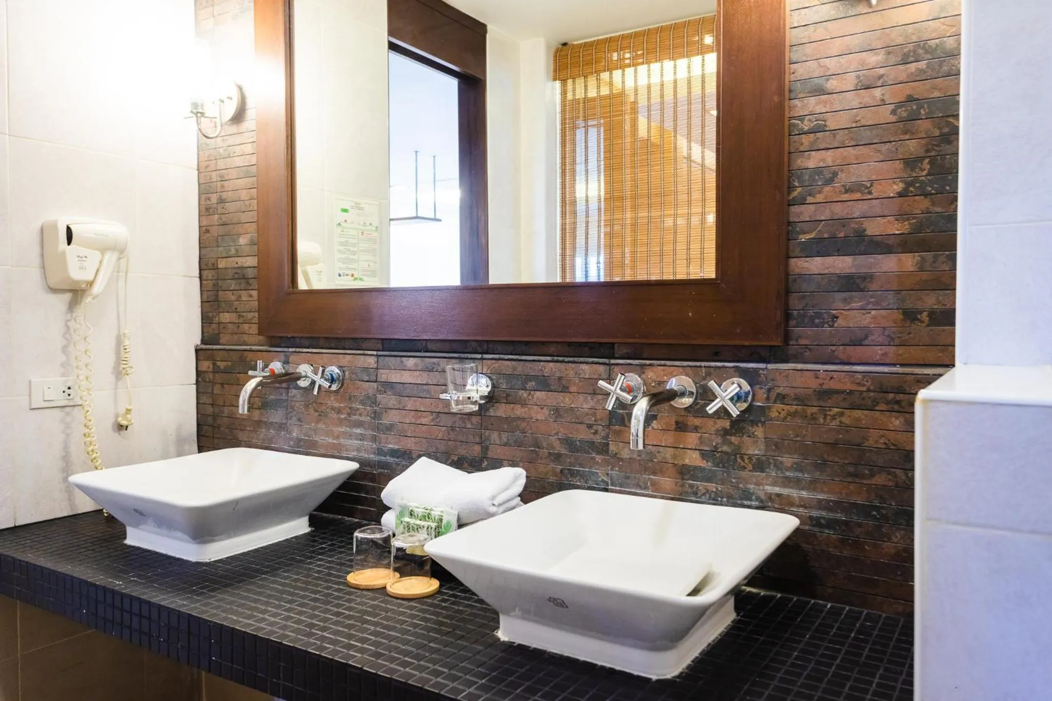 Toilet in Coconut Village Resort Phuket - SHA Extra Plus