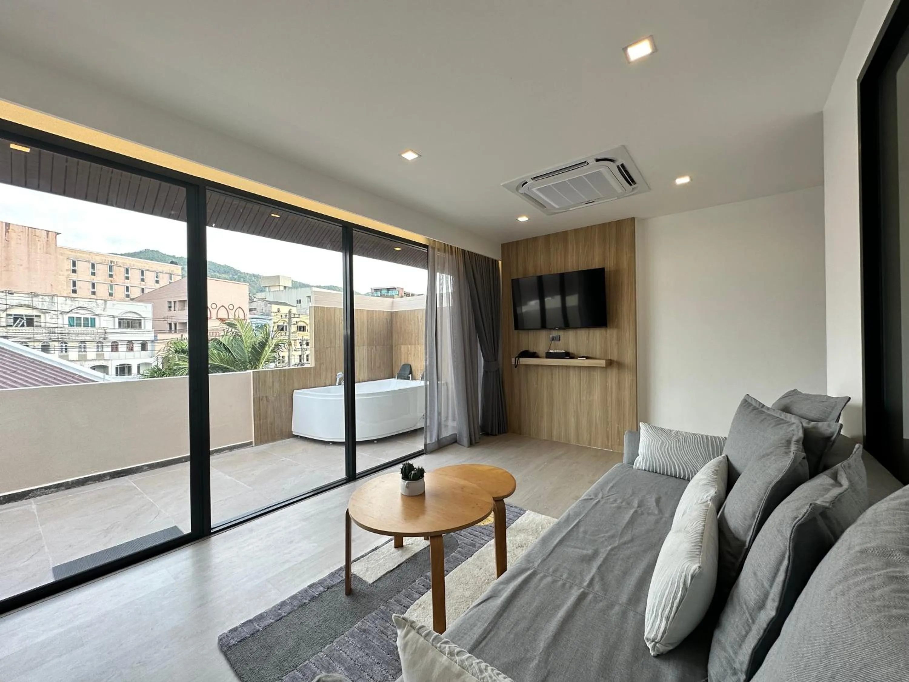 Living room in Coconut Village Resort Phuket - SHA Extra Plus