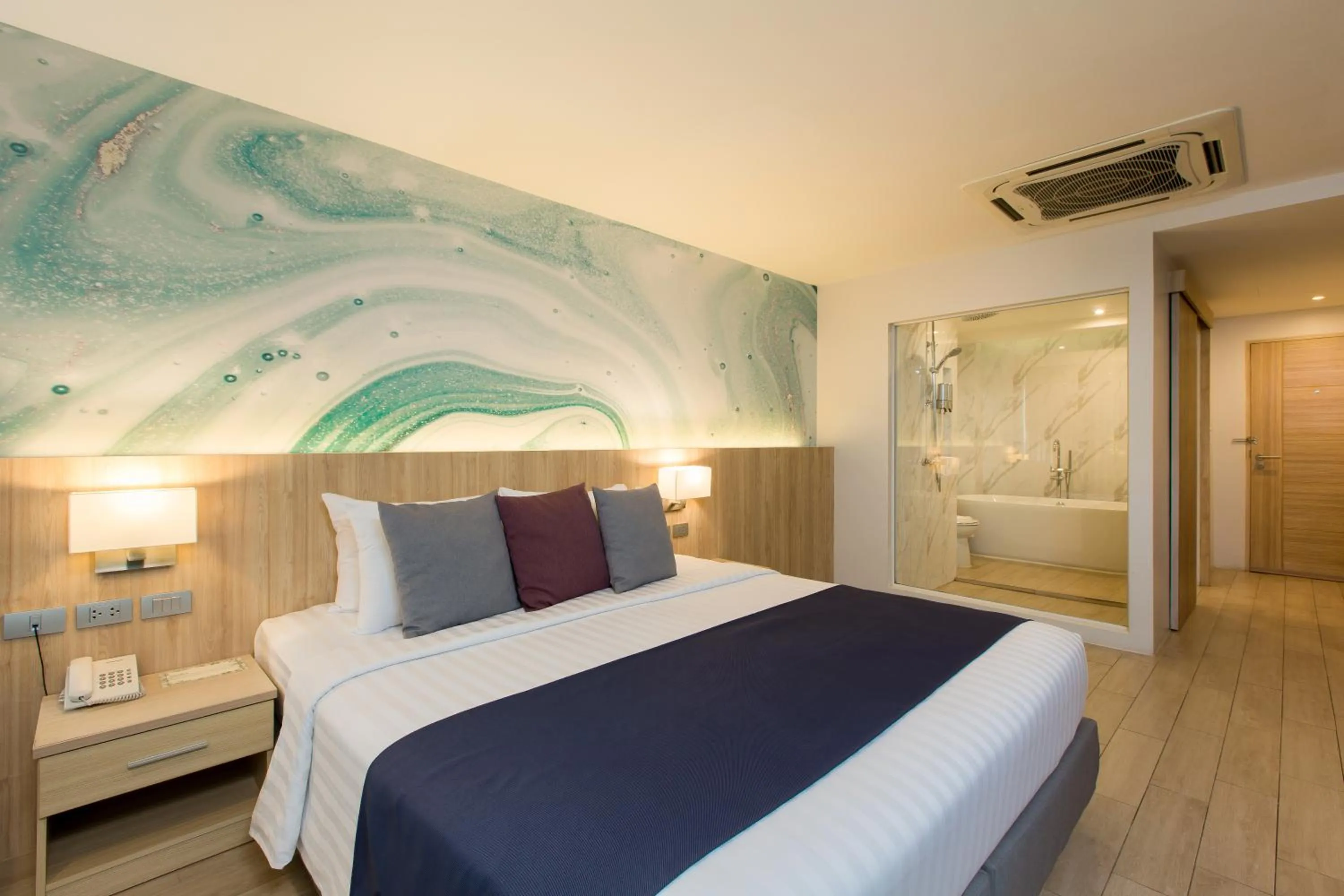 Bed in Coconut Village Resort Phuket - SHA Extra Plus