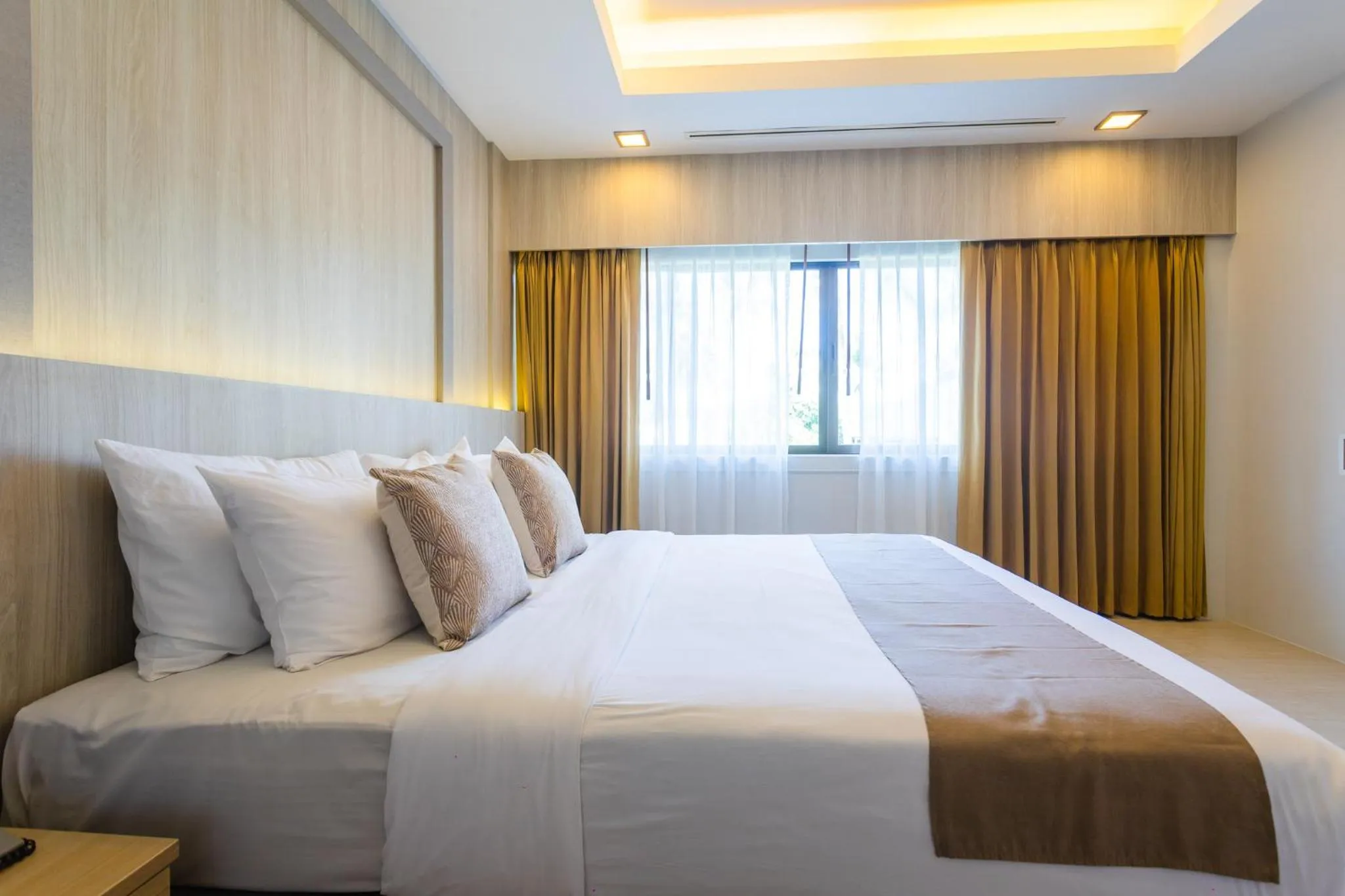 Bedroom, Bed in Coconut Village Resort Phuket - SHA Extra Plus