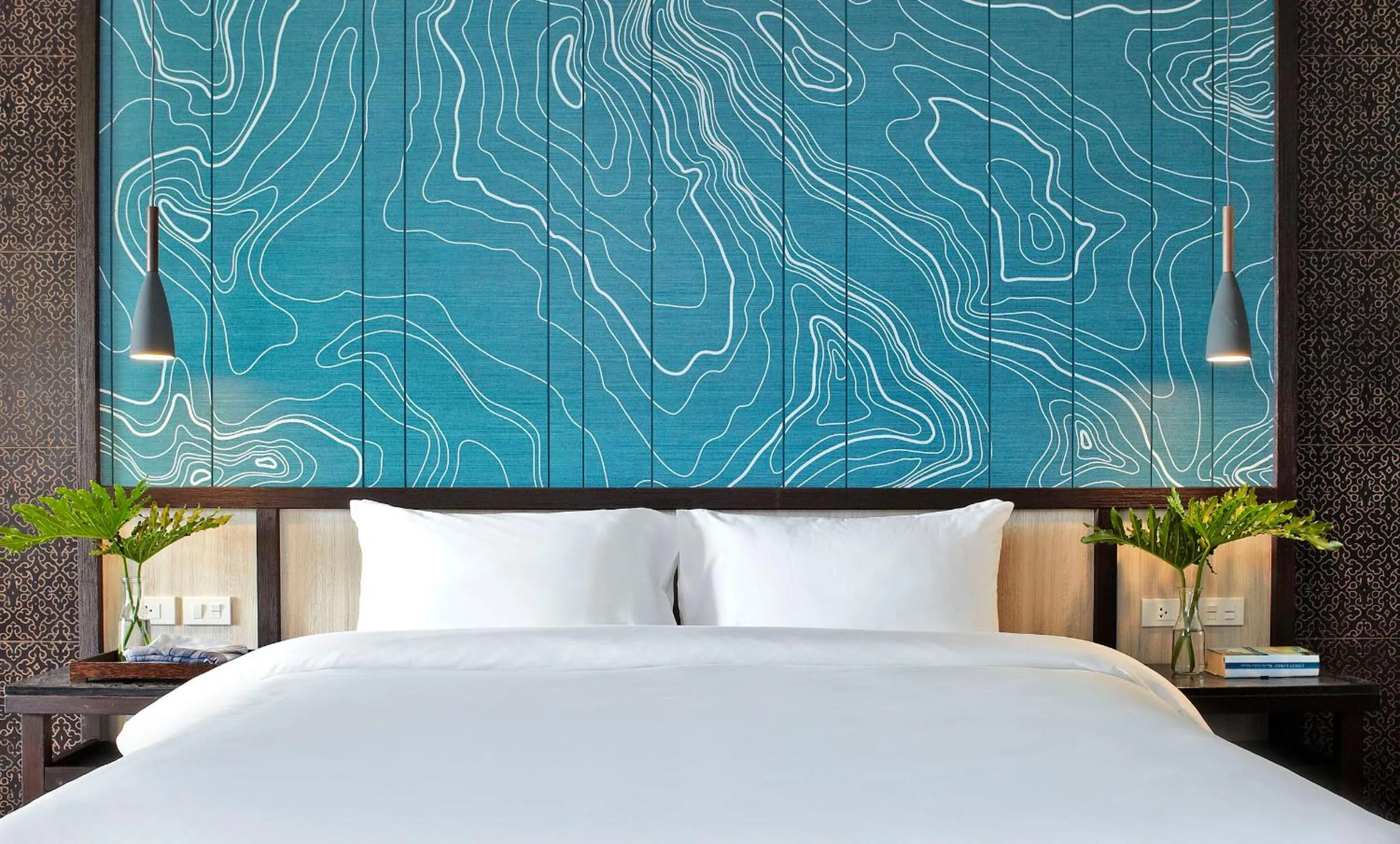 Bed in Sareeraya Villas & Suites