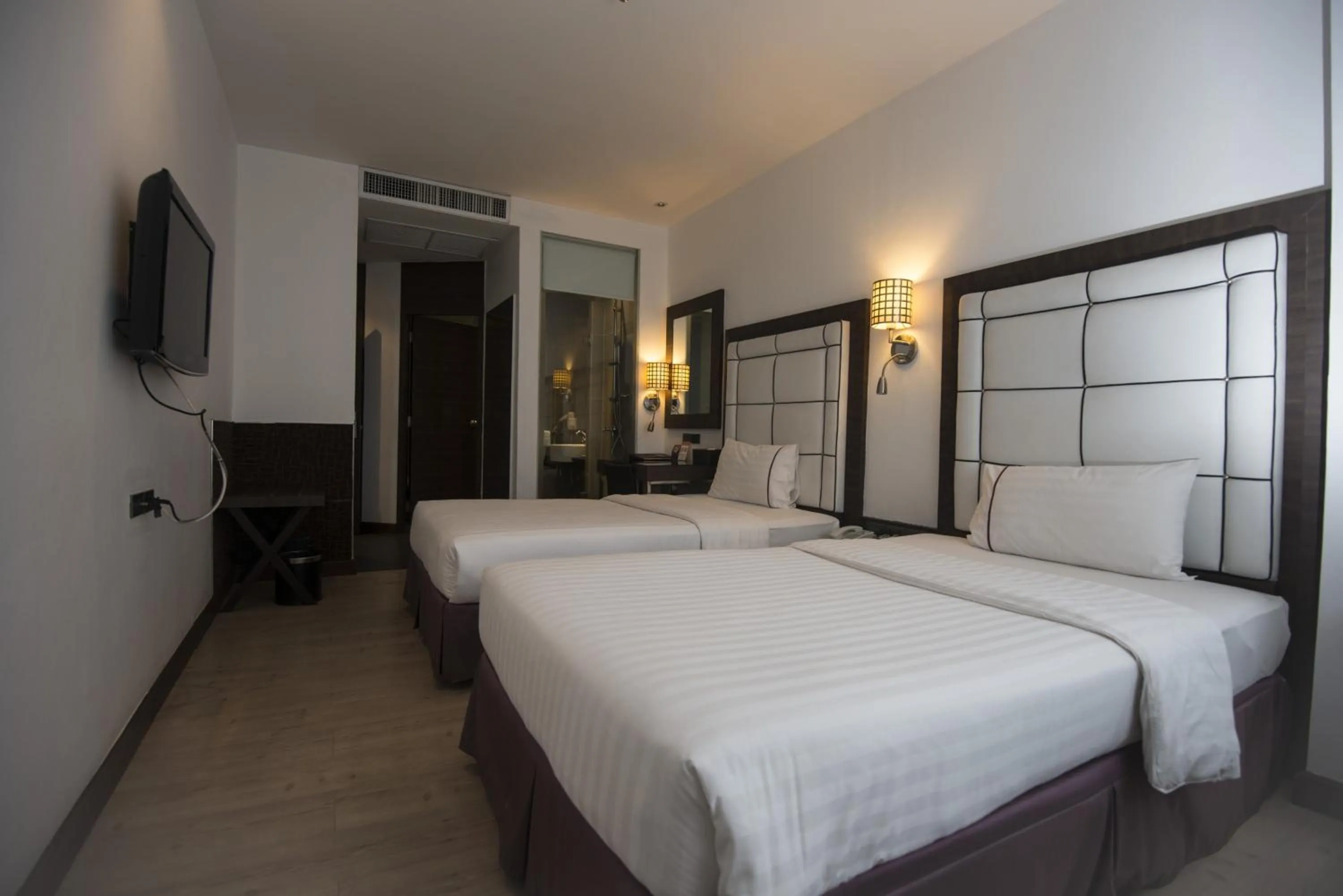 Bed in Sukhumvit Suites Hotel