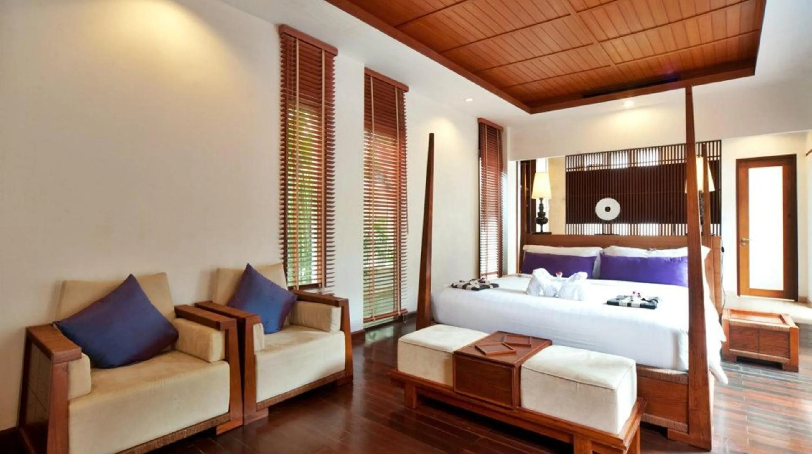 Bed in The Sarann Koh Samui, Suites & Villas