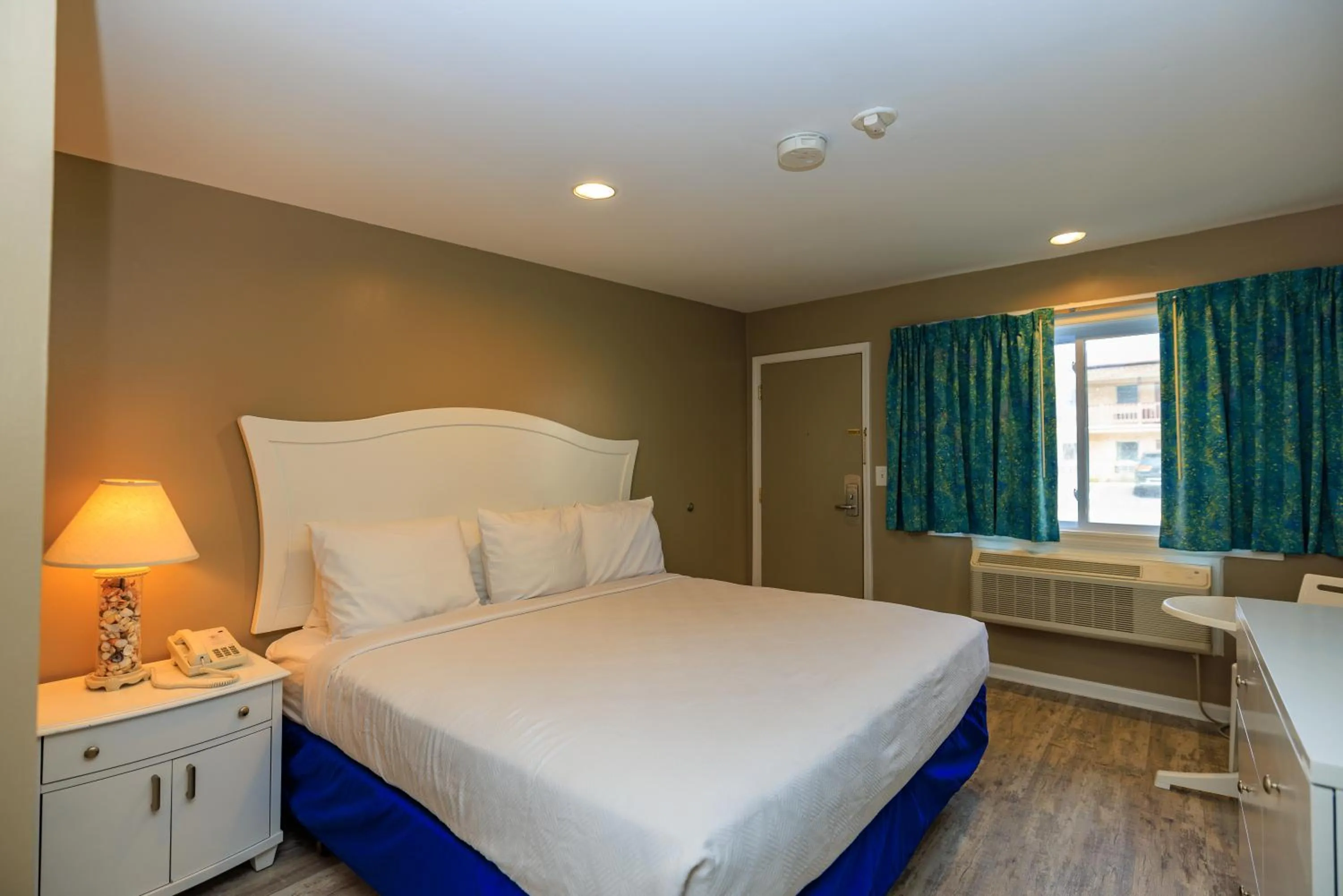 Bed in The White Sands Resort and Spa