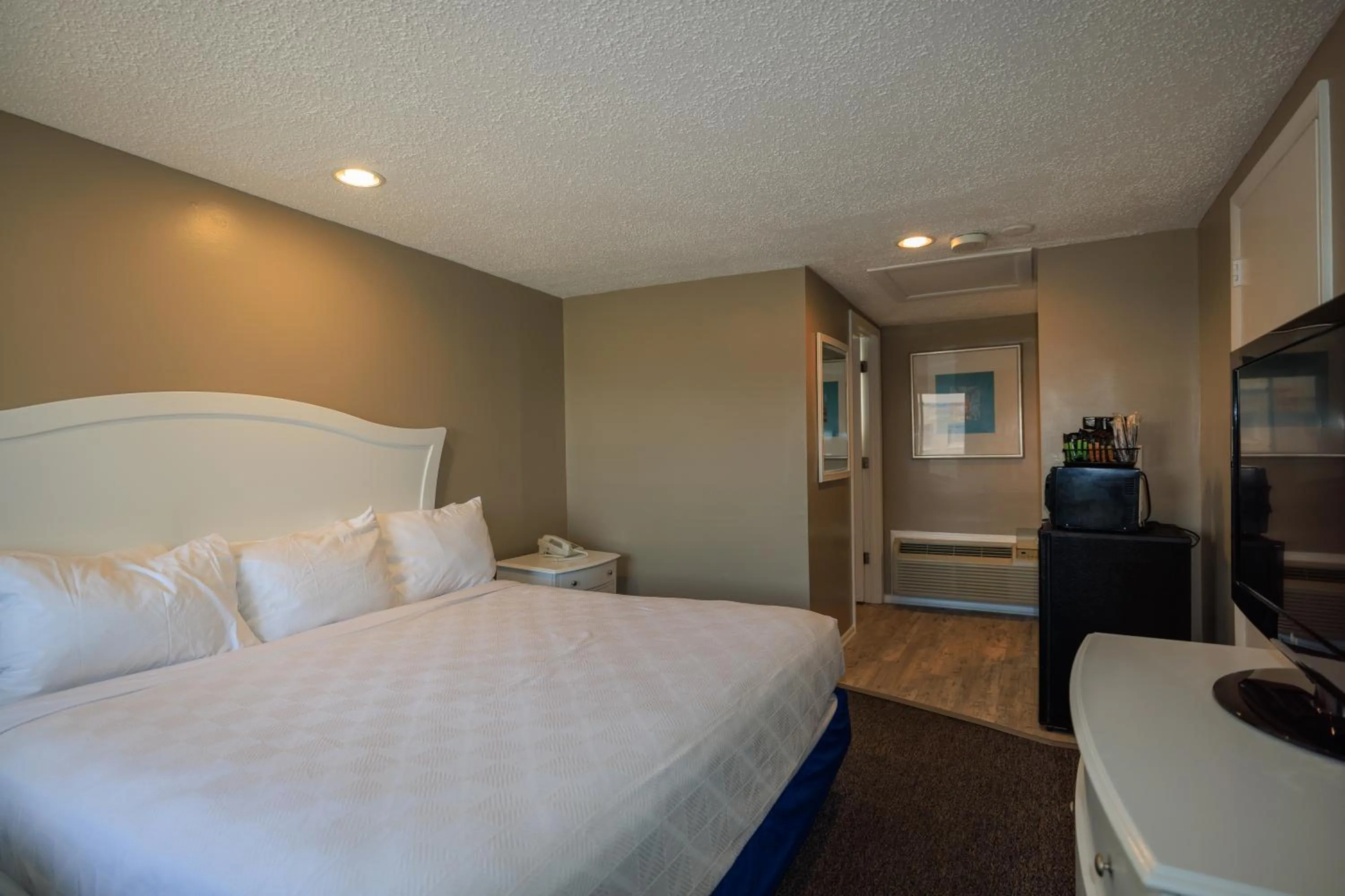 Bed in The White Sands Resort and Spa