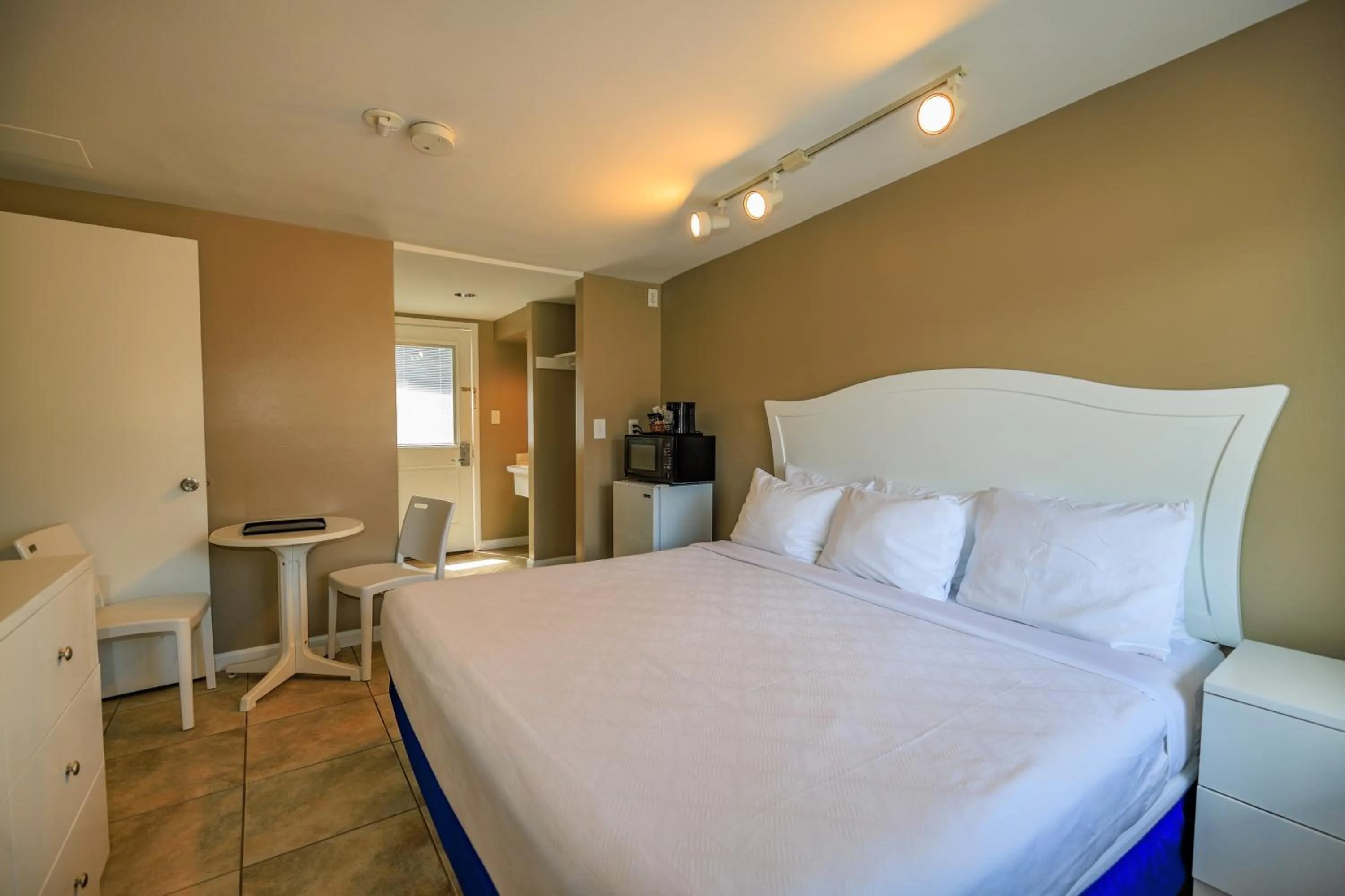 Bed in The White Sands Resort and Spa