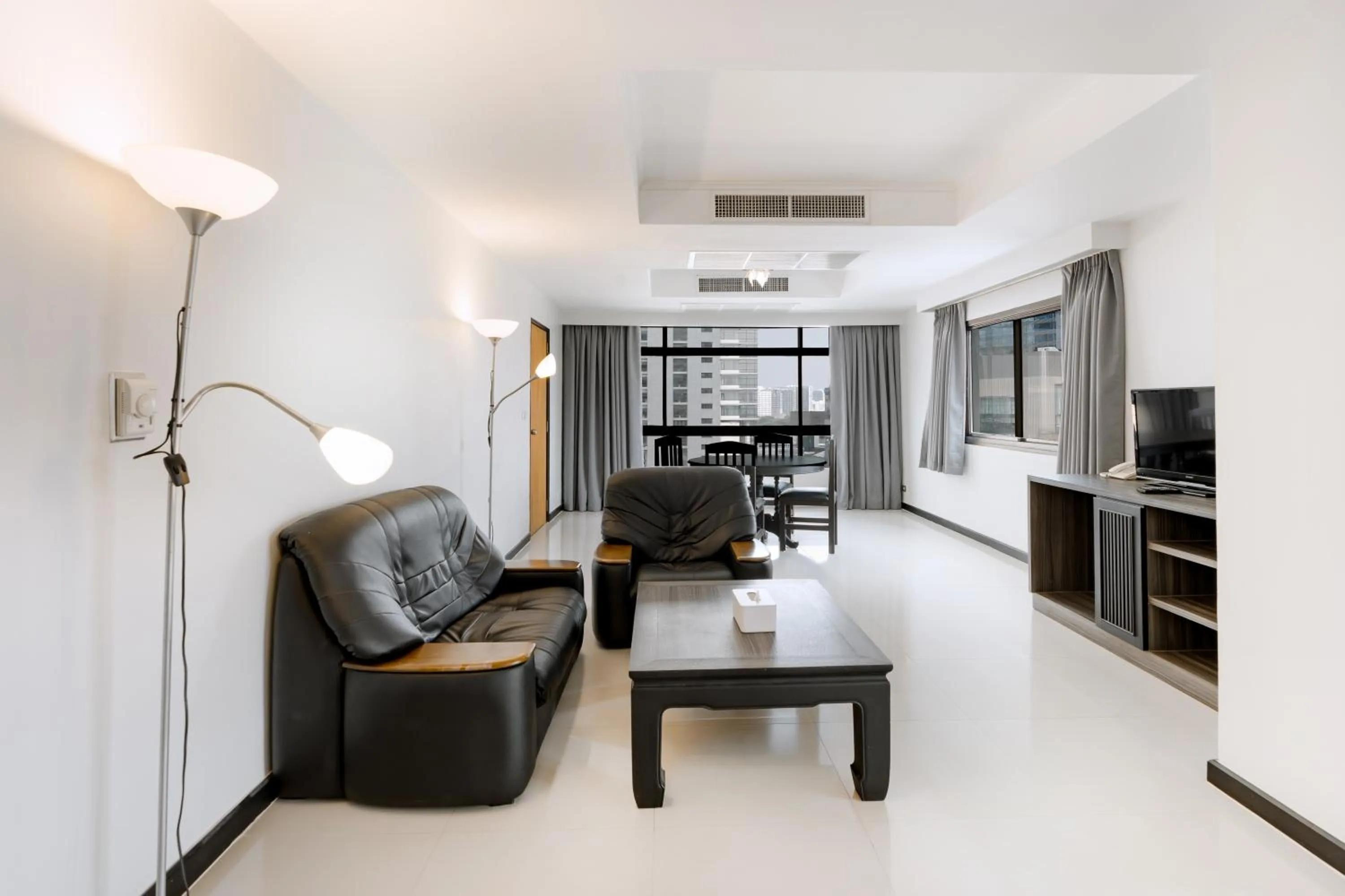 Living room in Pinnacle Lumpini Park Hotel