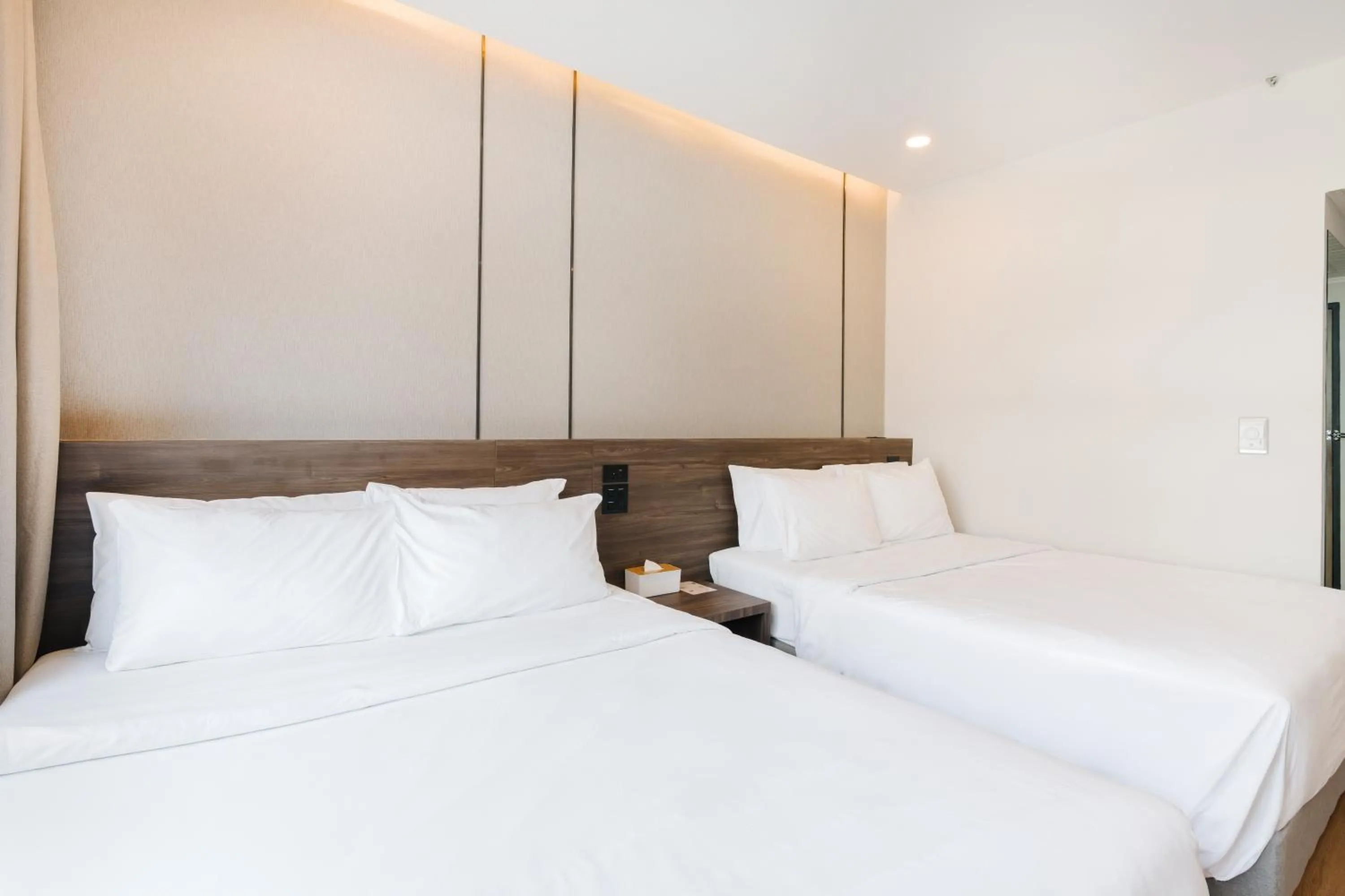 Bed in Pinnacle Lumpini Park Hotel