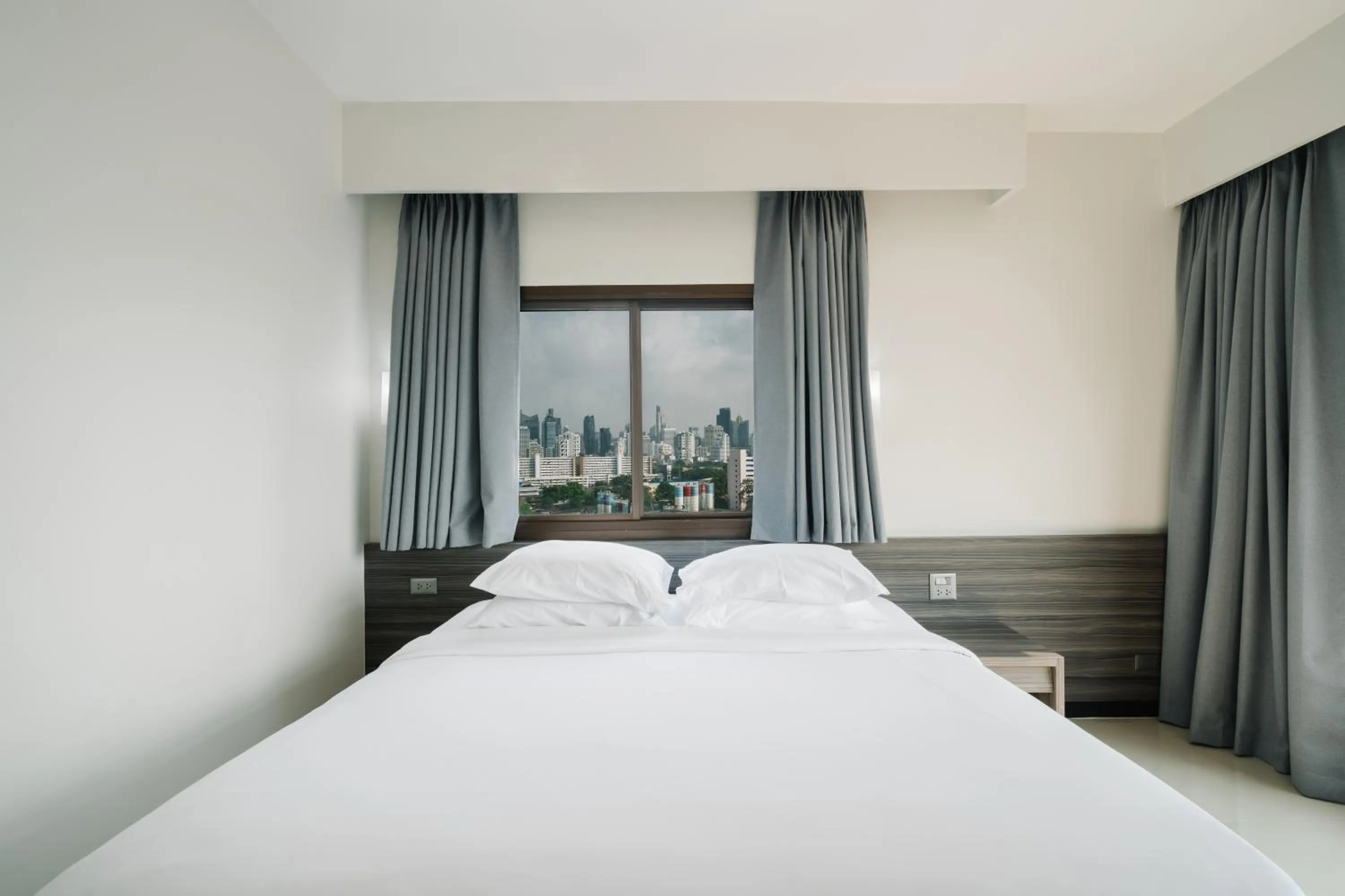 Bed in Pinnacle Lumpini Park Hotel