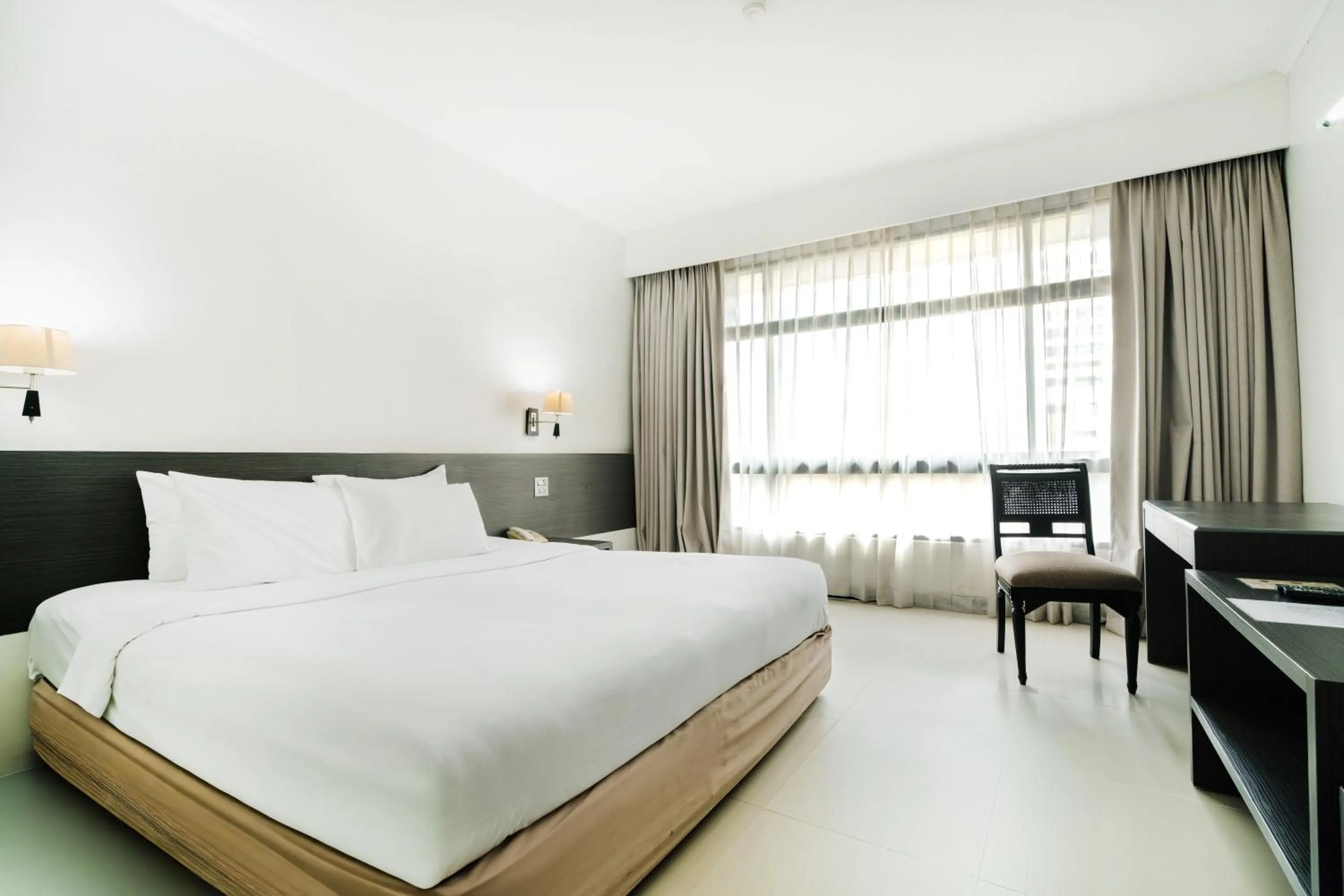 Bed in Pinnacle Lumpini Park Hotel