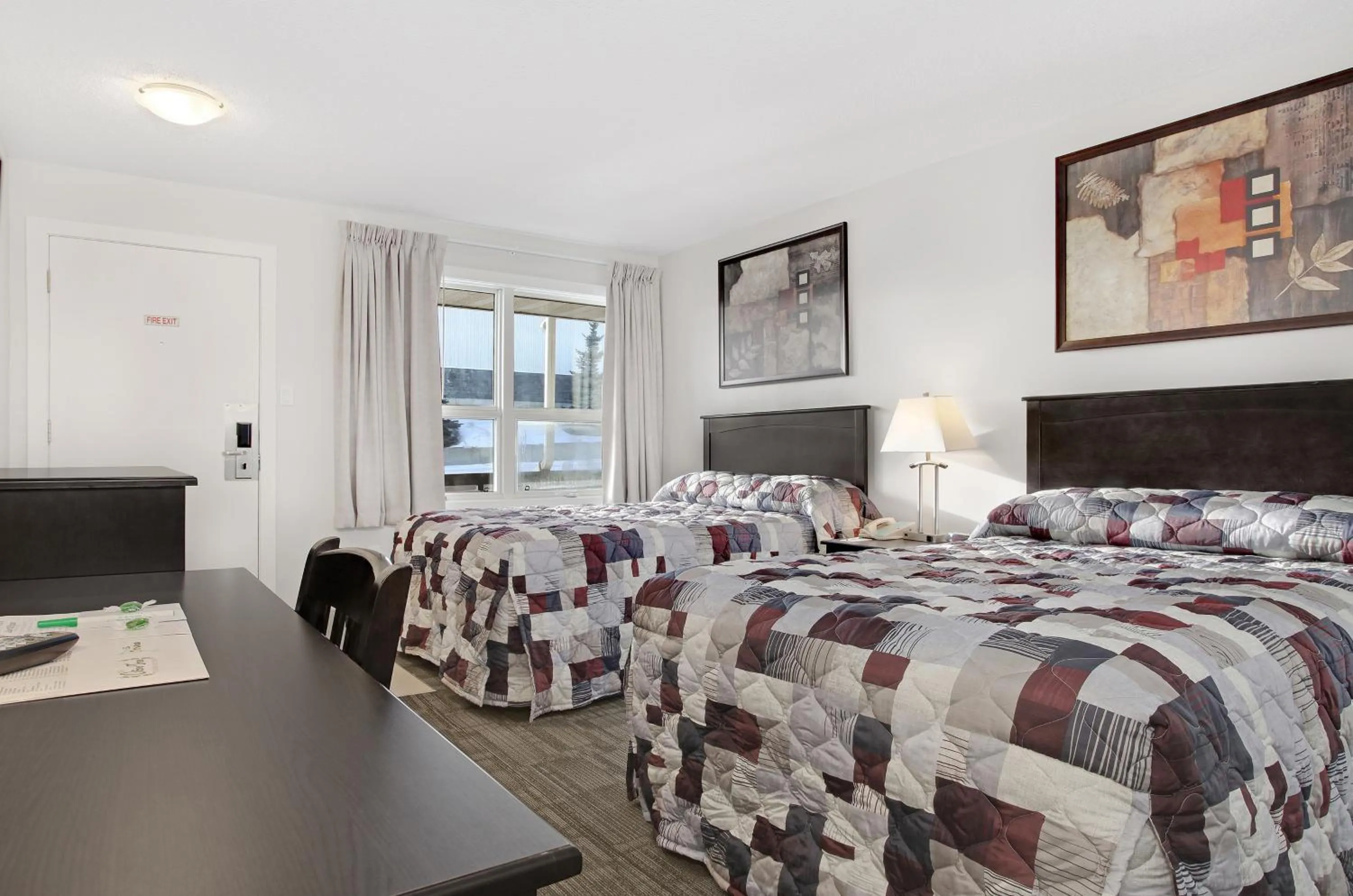 Bed in Guest House Inn & Suites