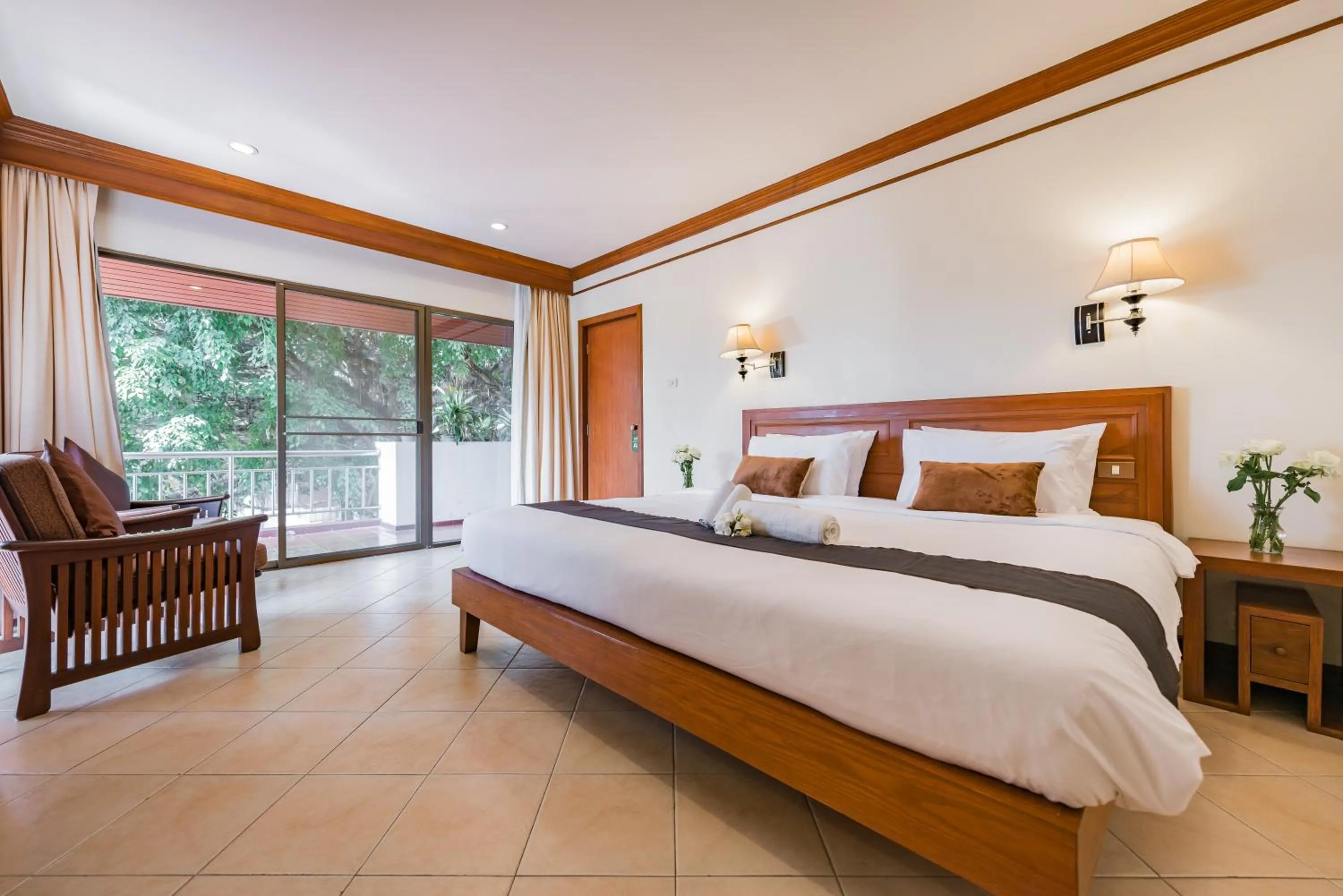 Bed in Pinnacle Grand Jomtien Resort and Beach Club