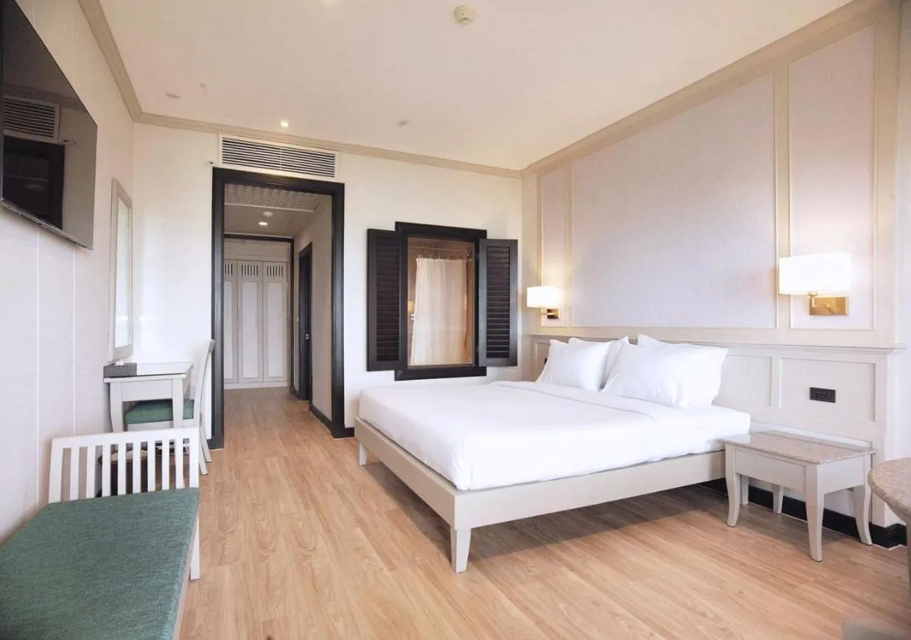 Bed in Pinnacle Grand Jomtien Resort and Beach Club