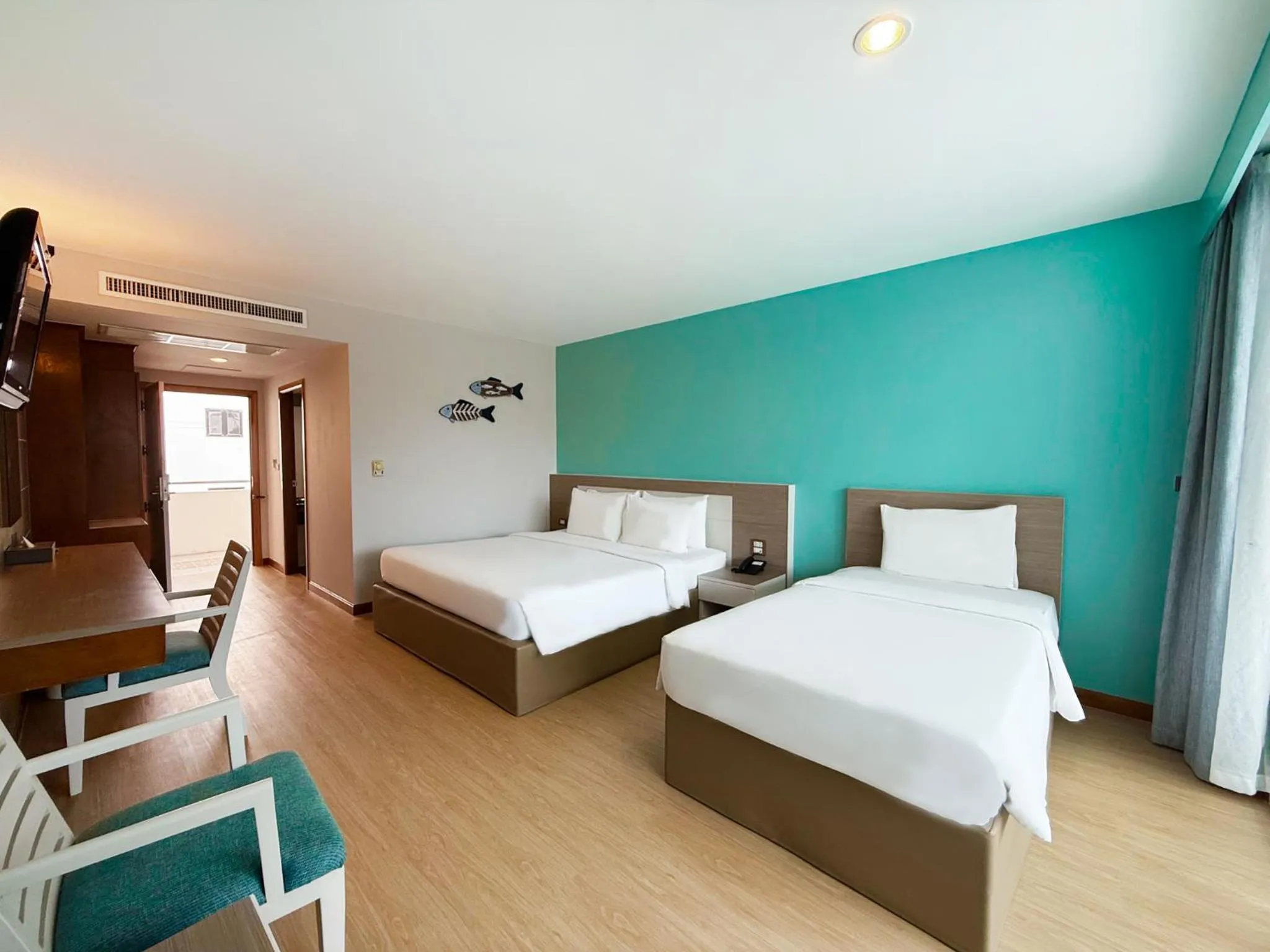 Bed in Pinnacle Grand Jomtien Resort and Beach Club