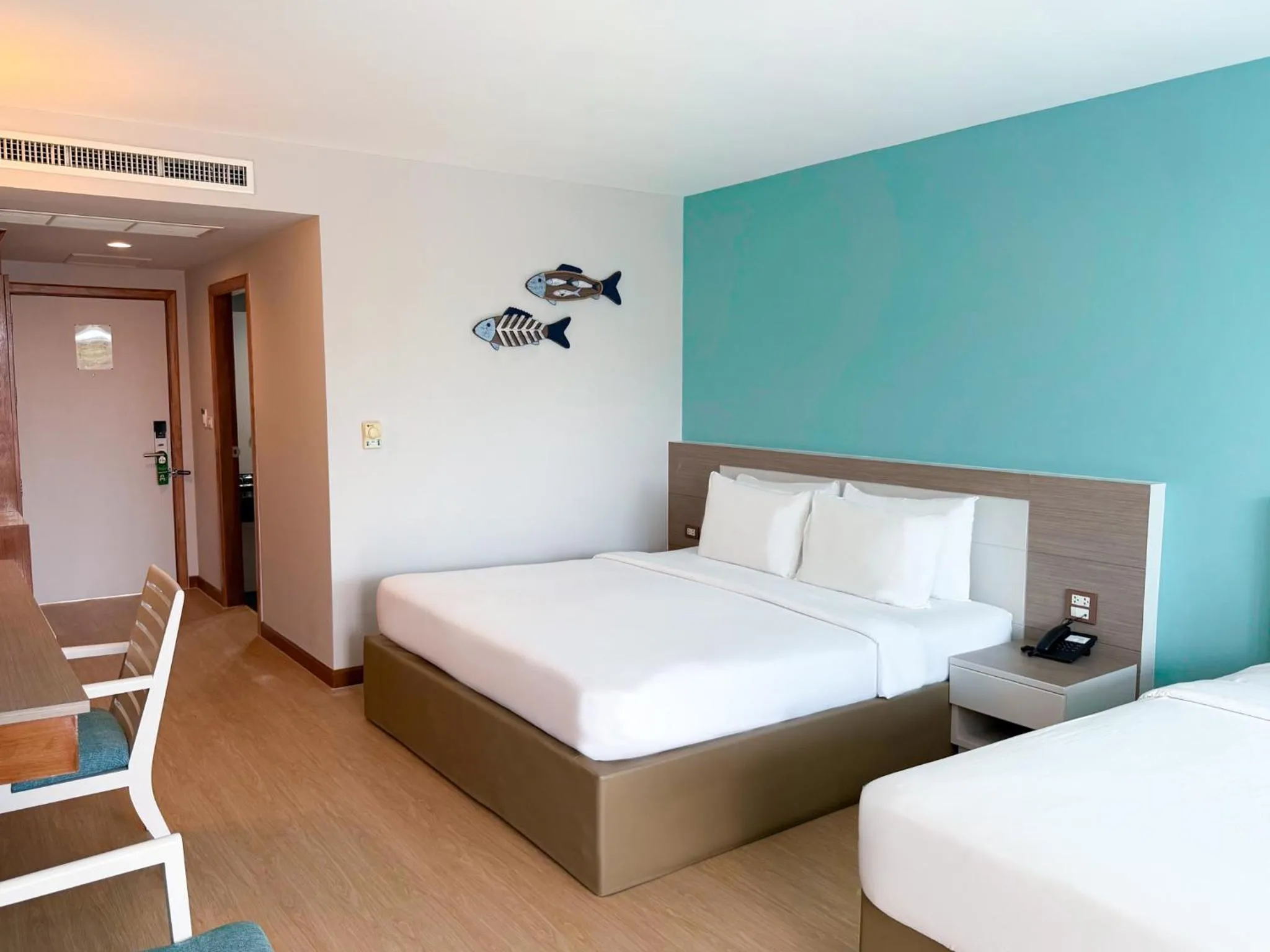 Bed in Pinnacle Grand Jomtien Resort and Beach Club
