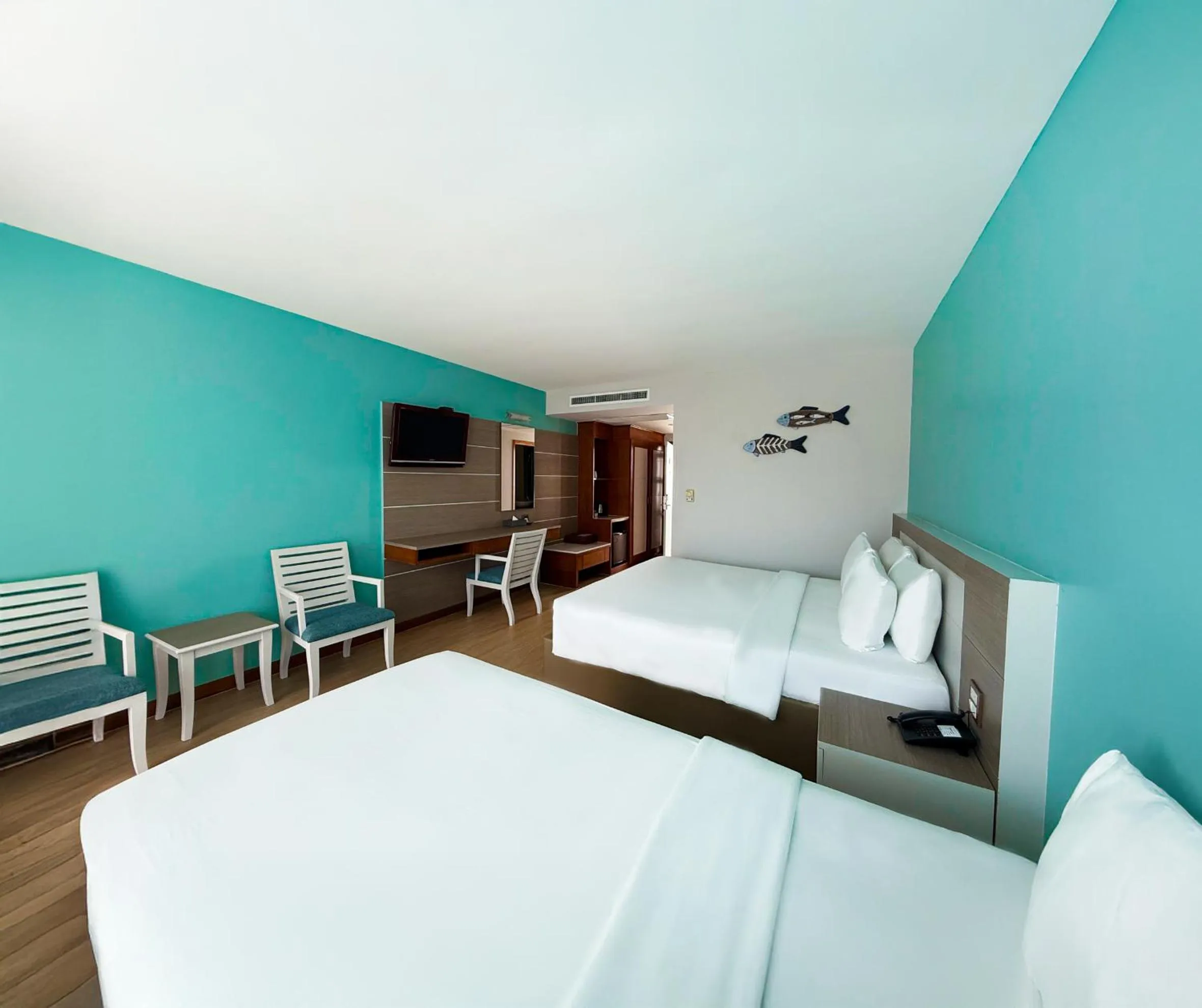 Bed in Pinnacle Grand Jomtien Resort and Beach Club