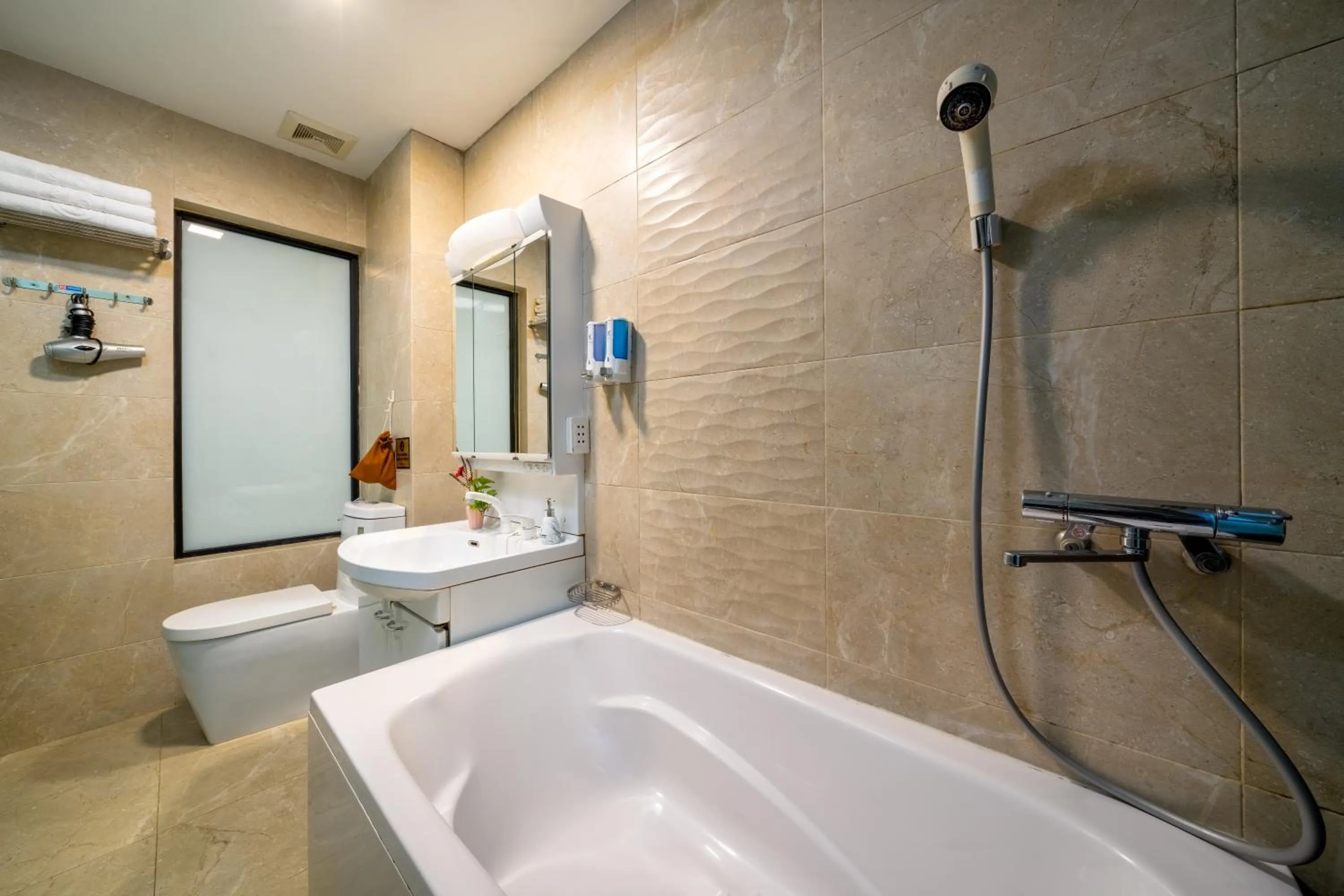 Bathroom in Bella Rosa Hotel & Travel