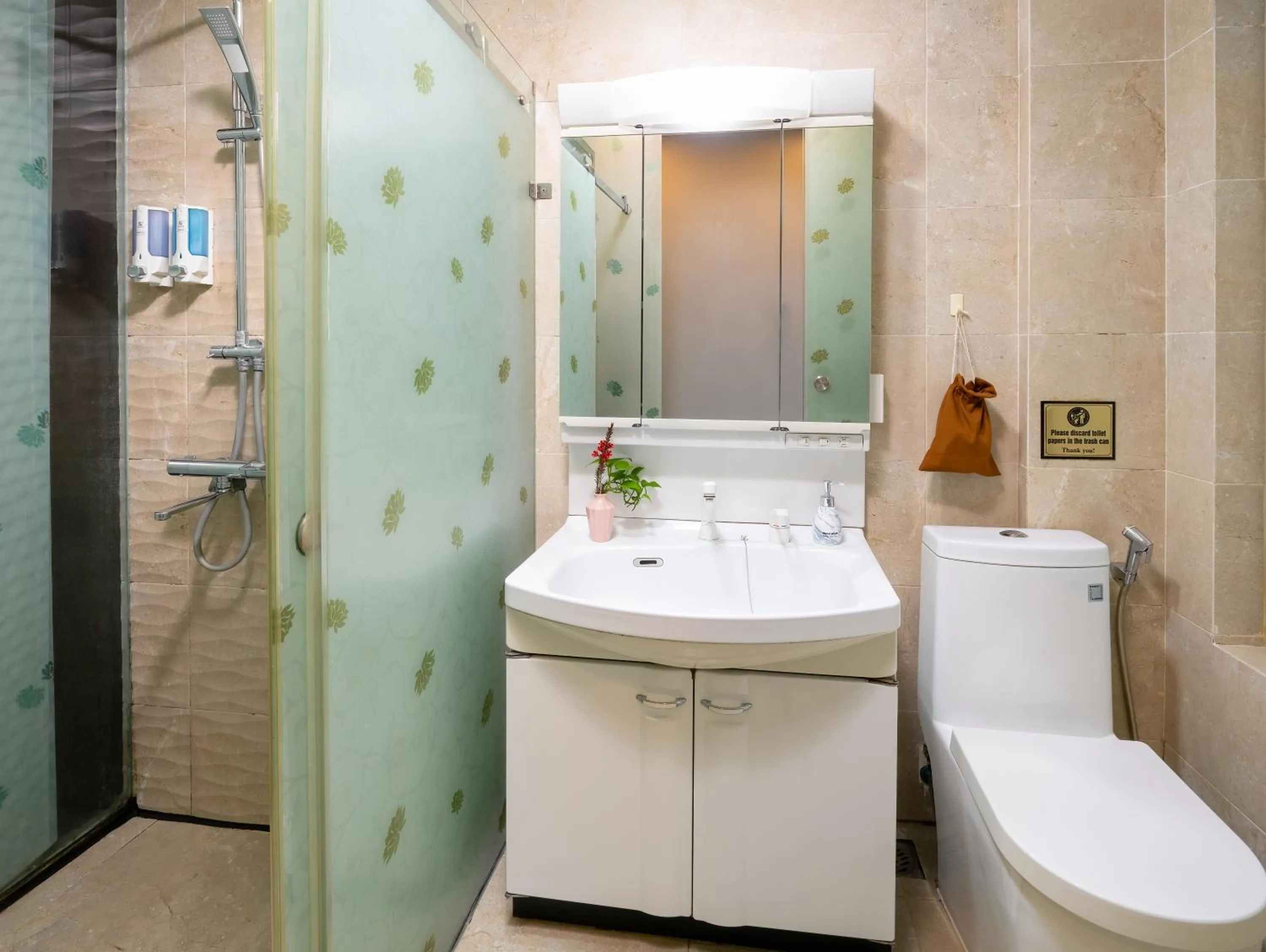 Toilet in Bella Rosa Hotel & Travel