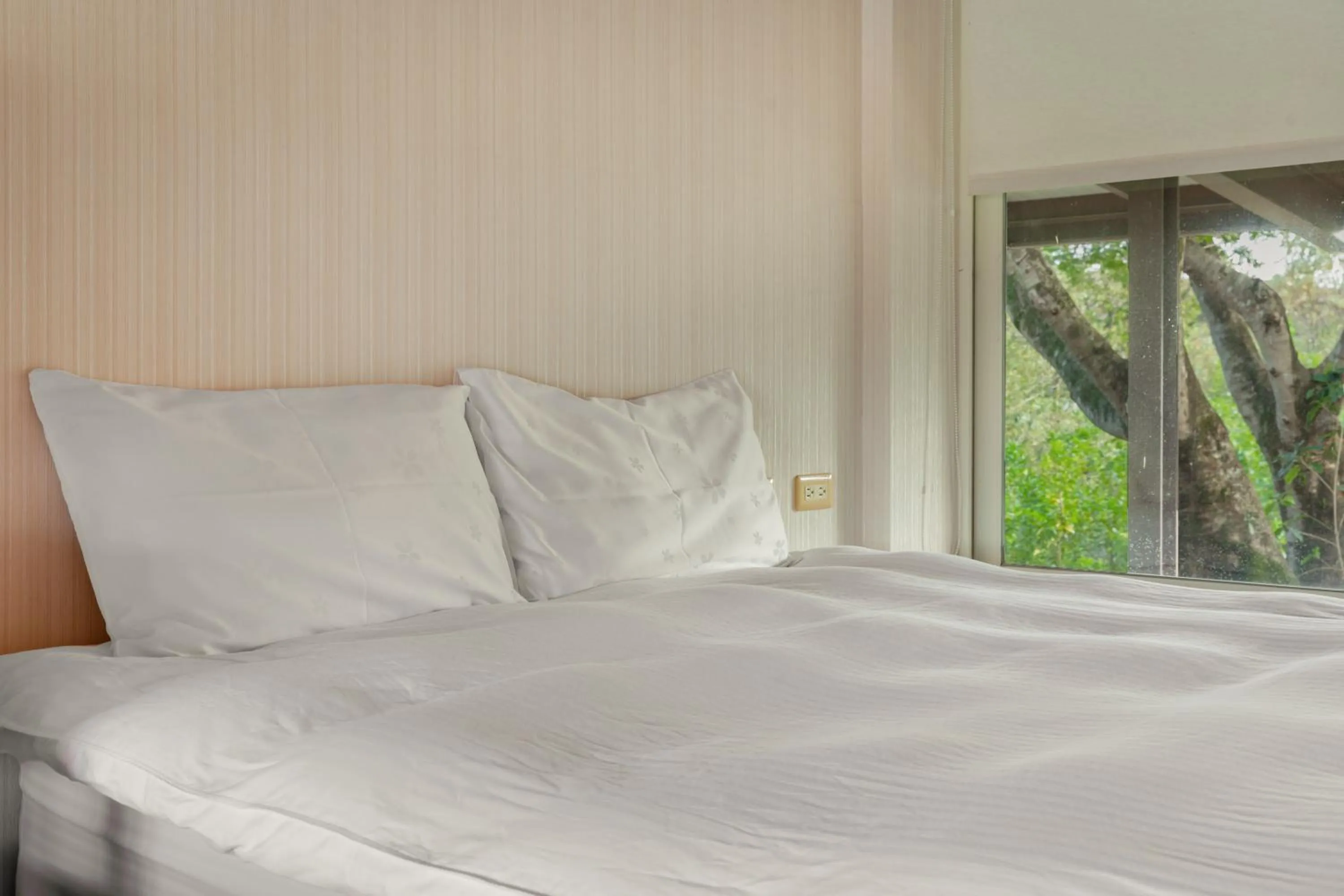 Bed in Green Forest Villa