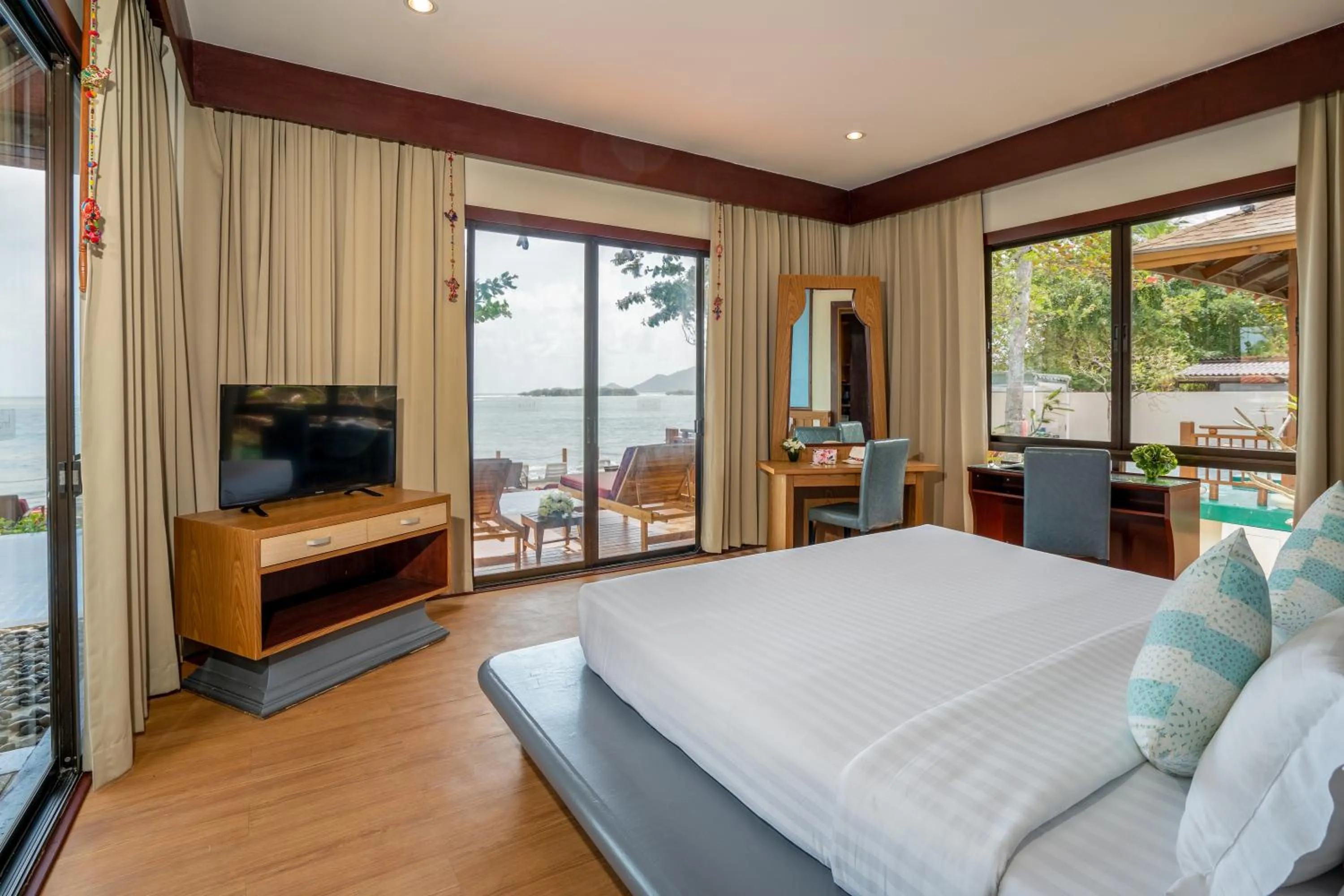 Bedroom, Bed in The Briza Beach Resort, Samui - SHA Plus