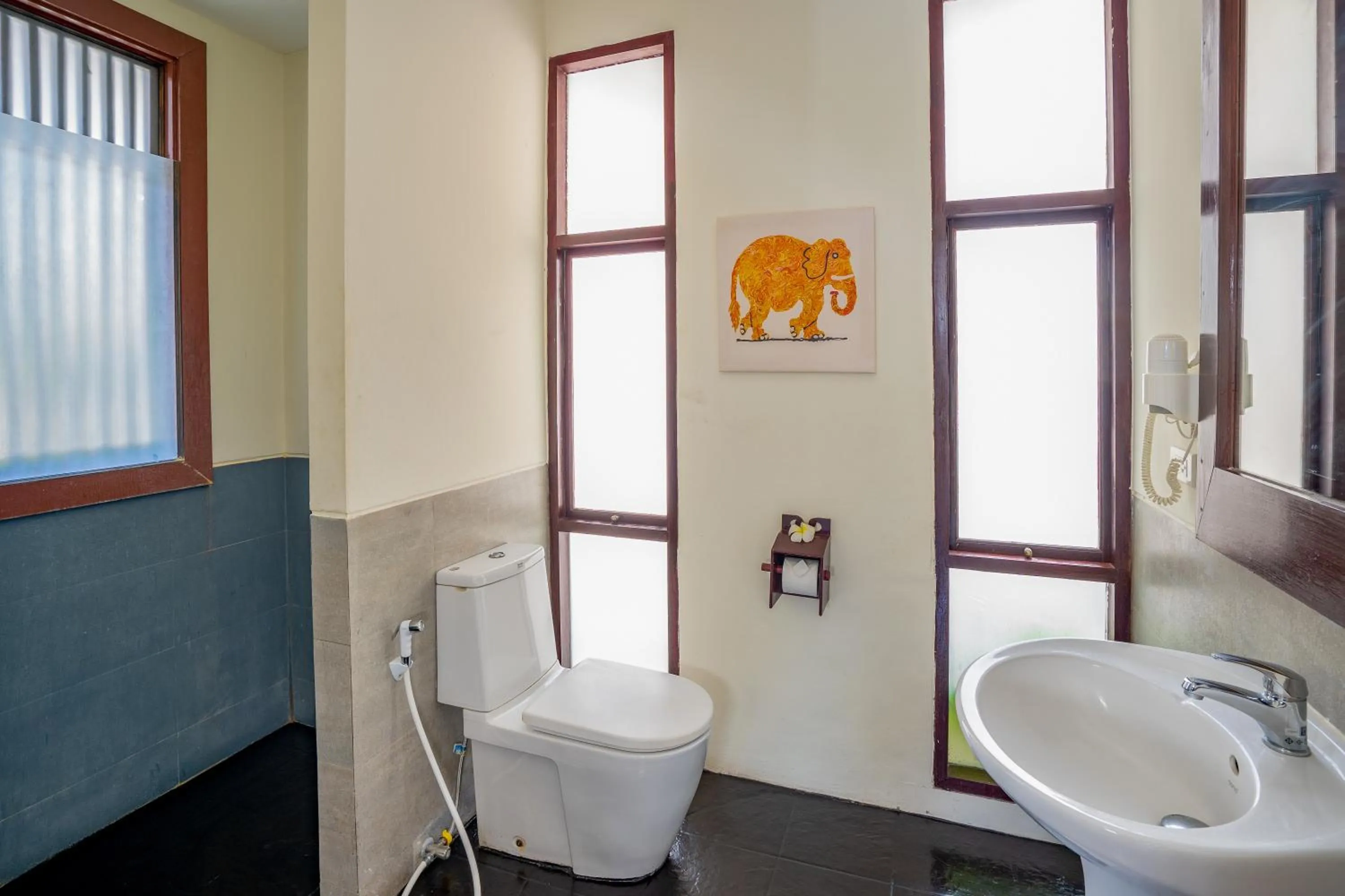 Toilet in The Briza Beach Resort, Samui - SHA Plus