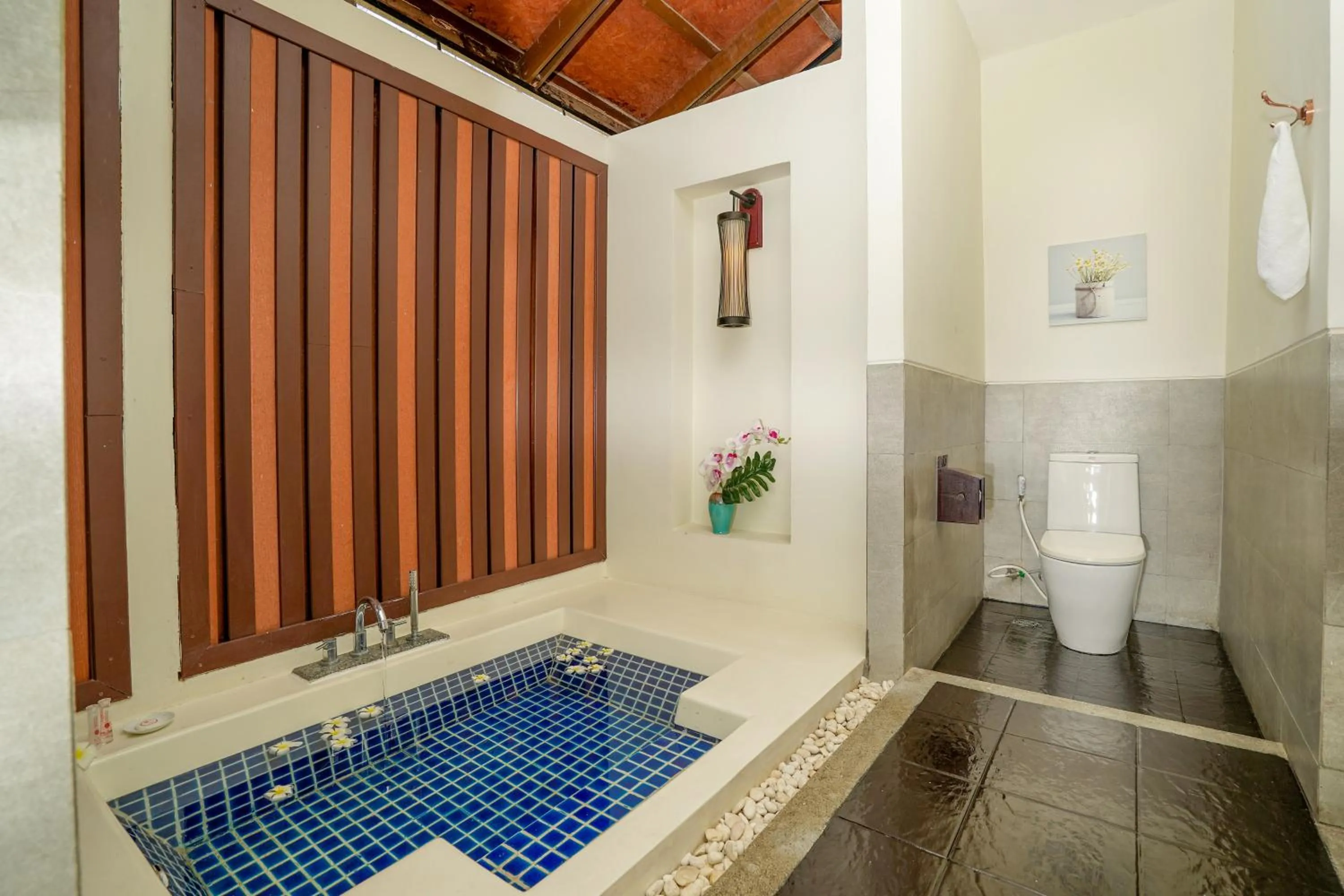 Toilet in The Briza Beach Resort, Samui - SHA Plus