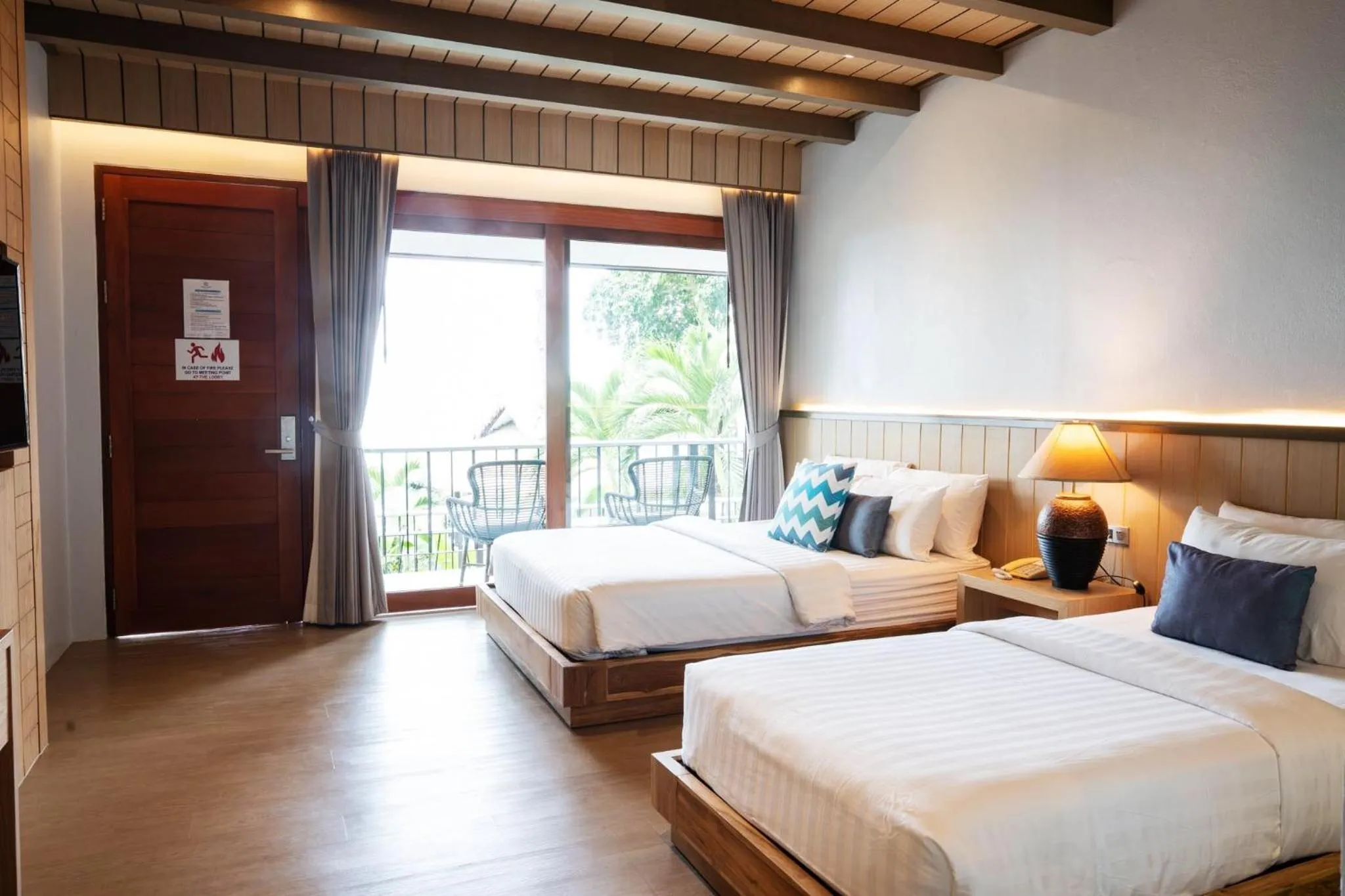 Bed in Coral Cliff Beach Resort Samui - SHA Plus