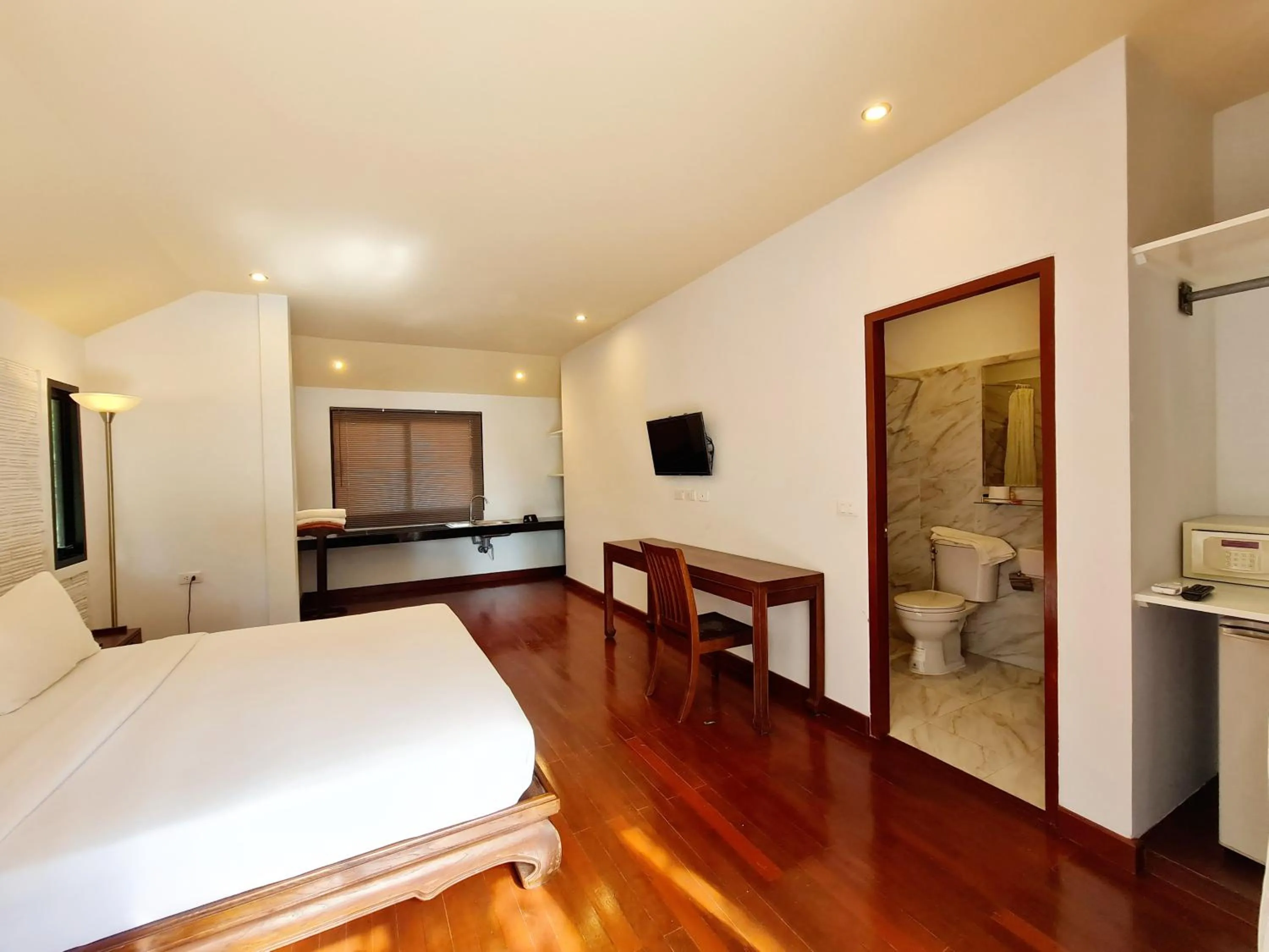 Bed in ASTROCOCO beach resort by Coconut Beach