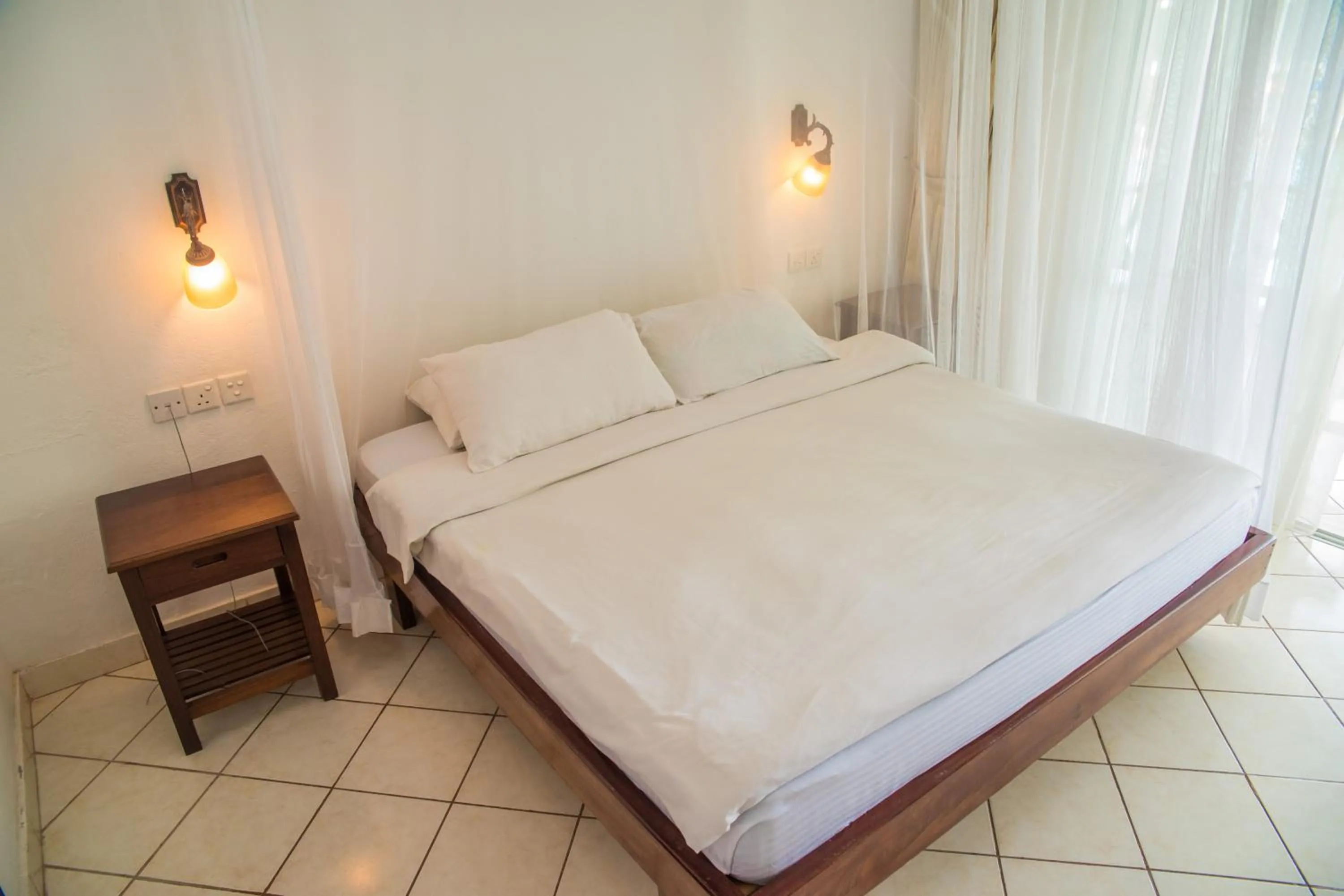 Bed in Nyali Beach Holiday Resort