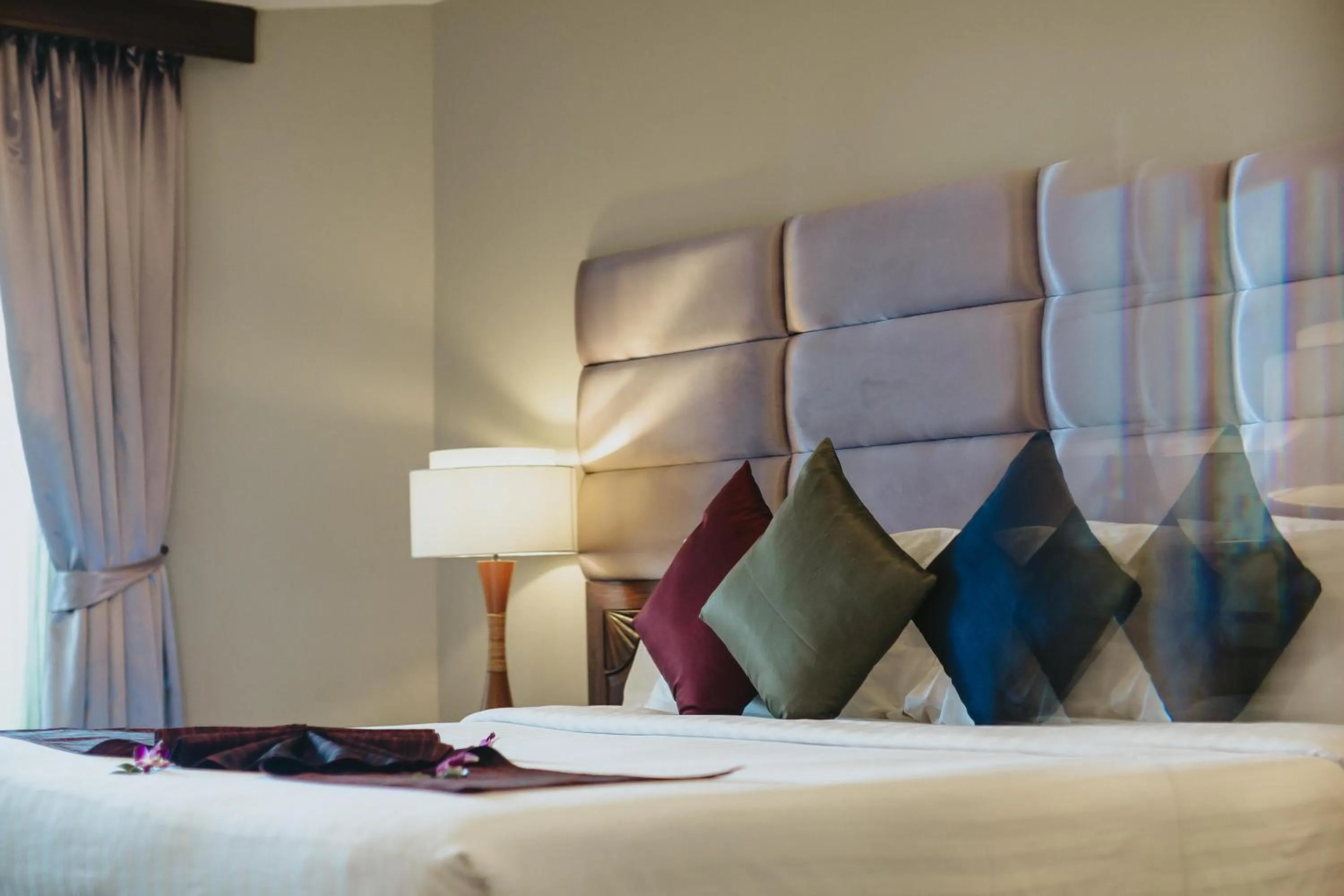 Bed in Nora Beach Resort & Spa - SHA Extra Plus