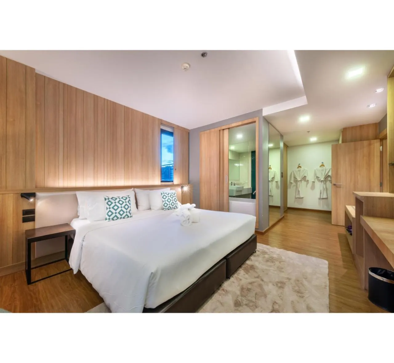 Bed in PLAAI Prime Hotel Rayong SHA Extra Plus