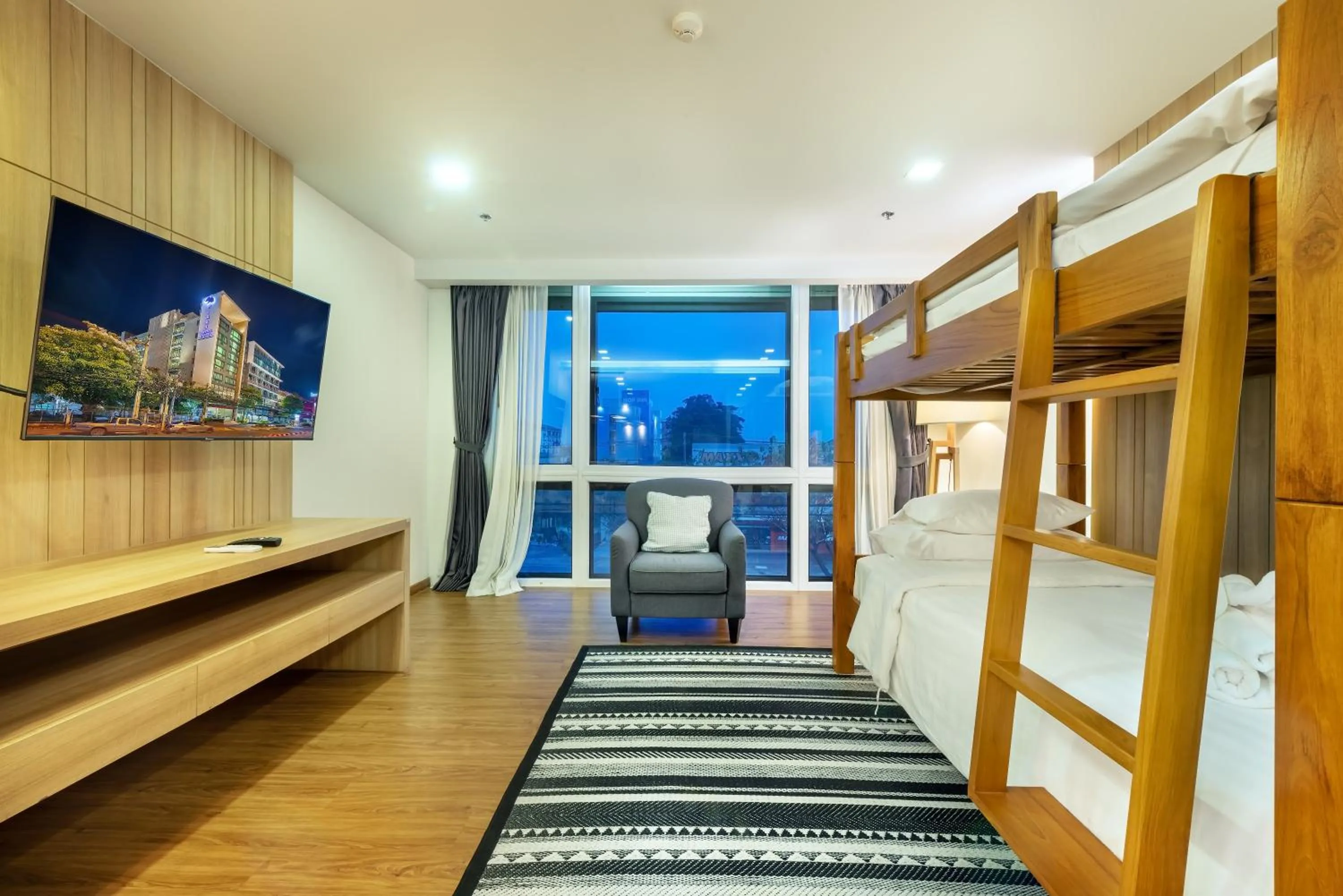 TV and multimedia, Bed in PLAAI Prime Hotel Rayong SHA Extra Plus