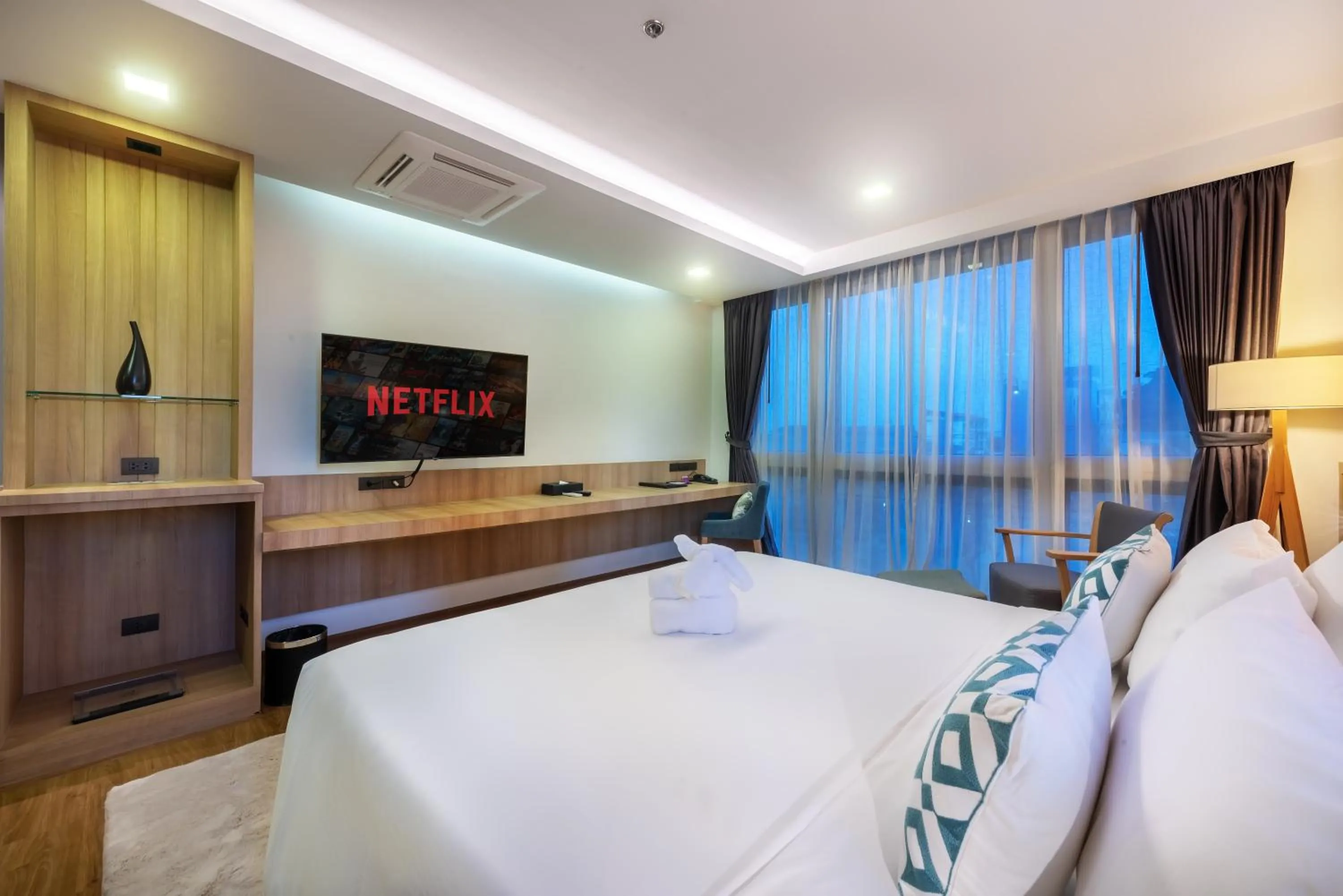 Bed in PLAAI Prime Hotel Rayong SHA Extra Plus