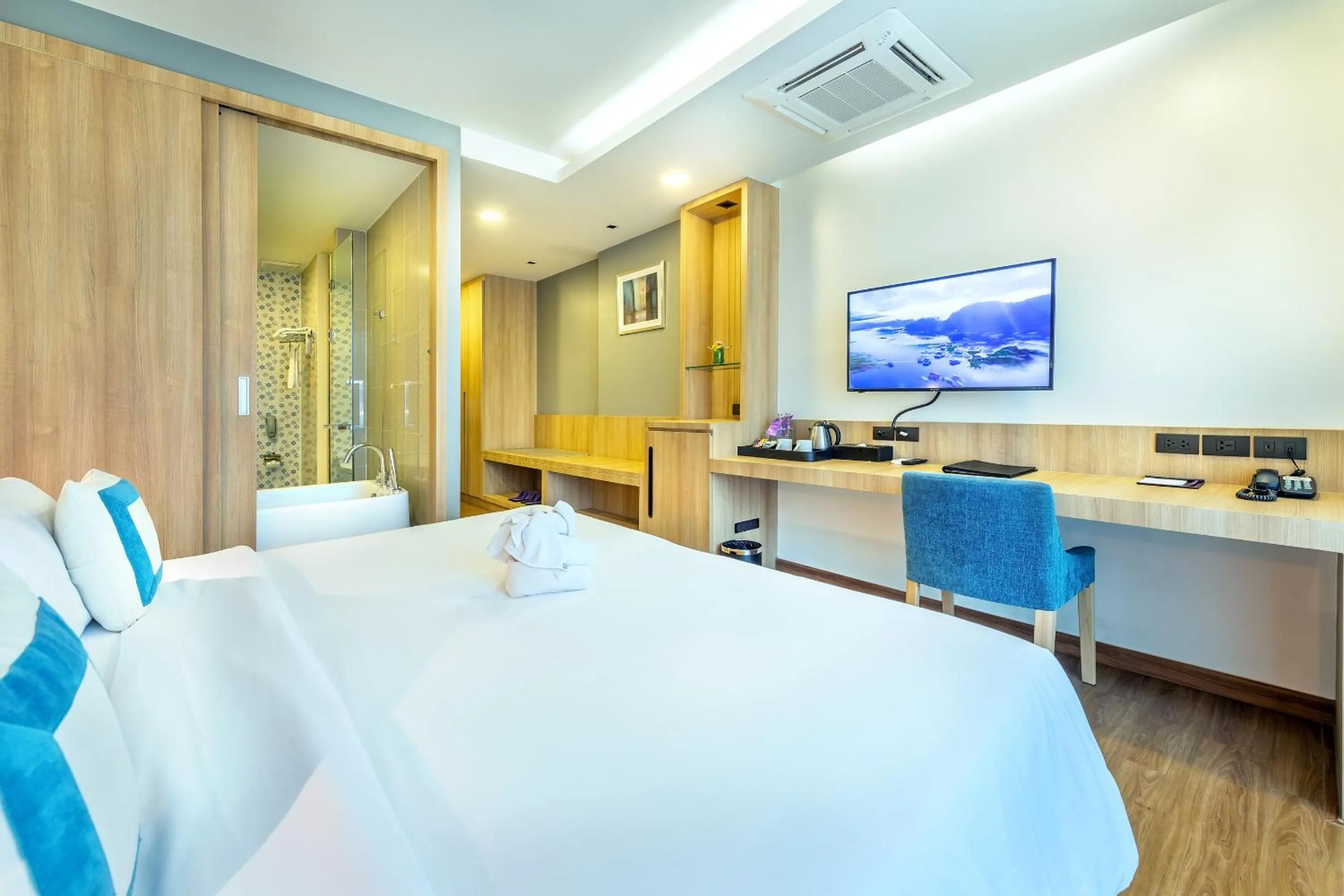 Bed in PLAAI Prime Hotel Rayong SHA Extra Plus