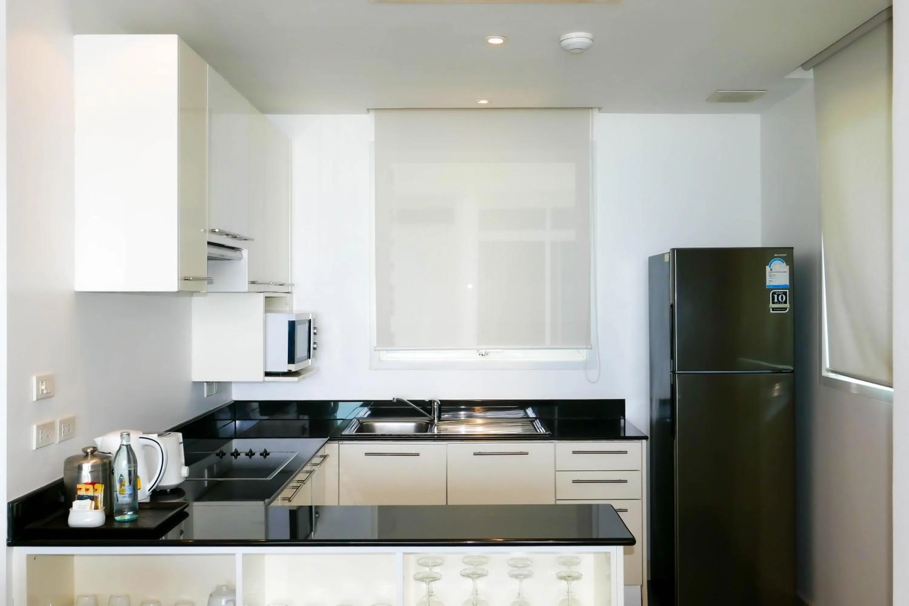 Kitchen or kitchenette in Paradox Resort Phuket