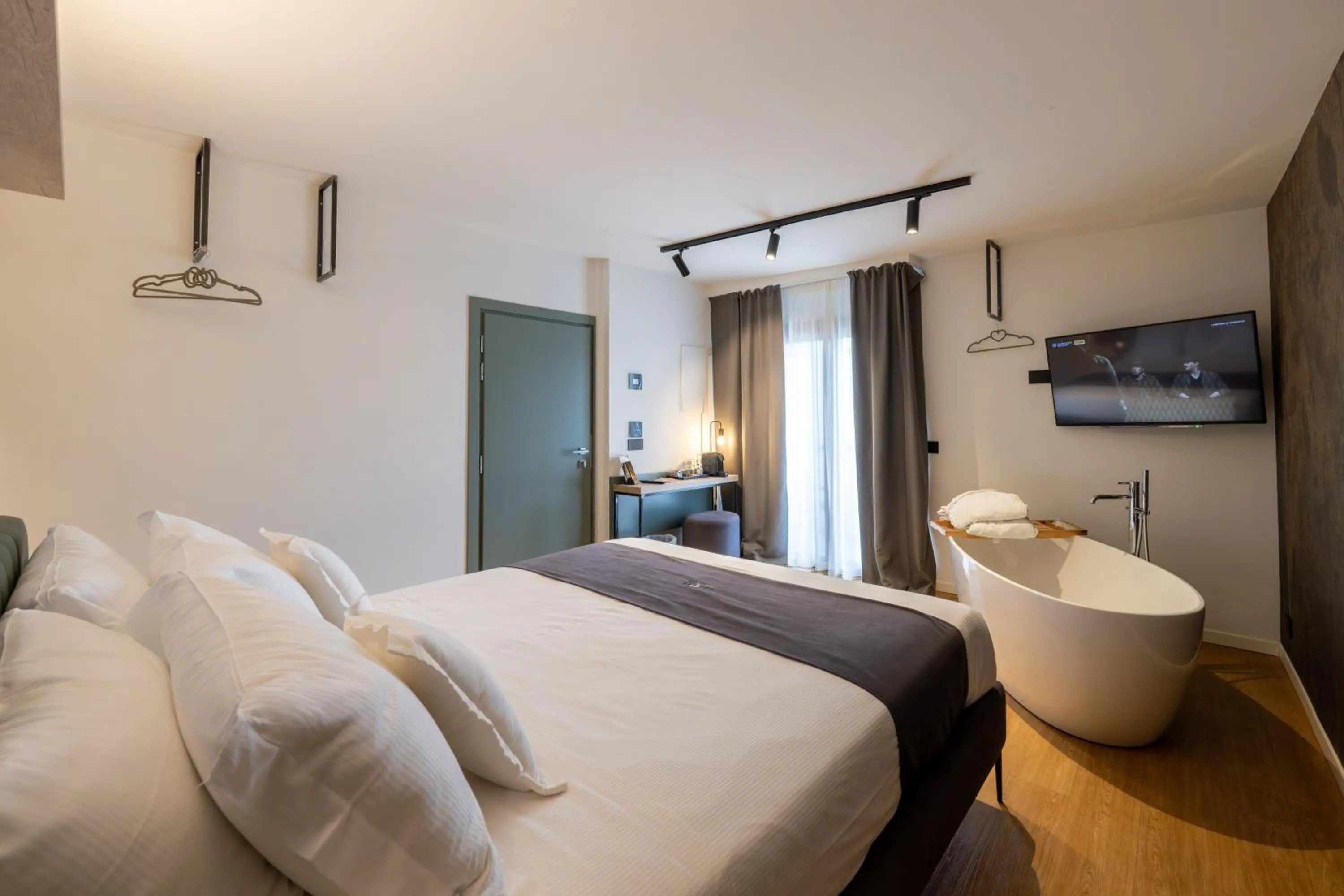 Bed in Meg Lifestyle Hotel & Apartaments