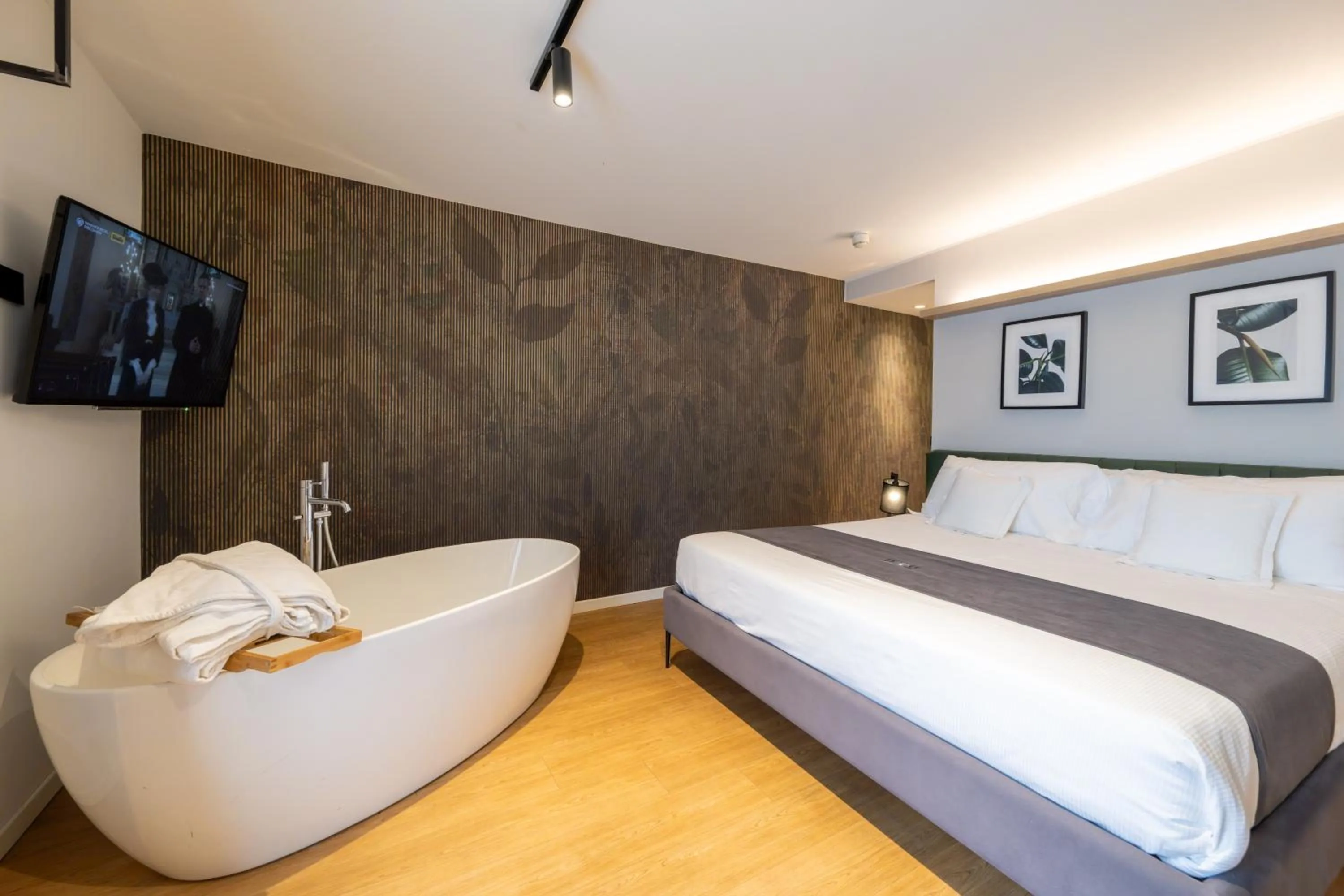 Bed in Meg Lifestyle Hotel & Apartaments