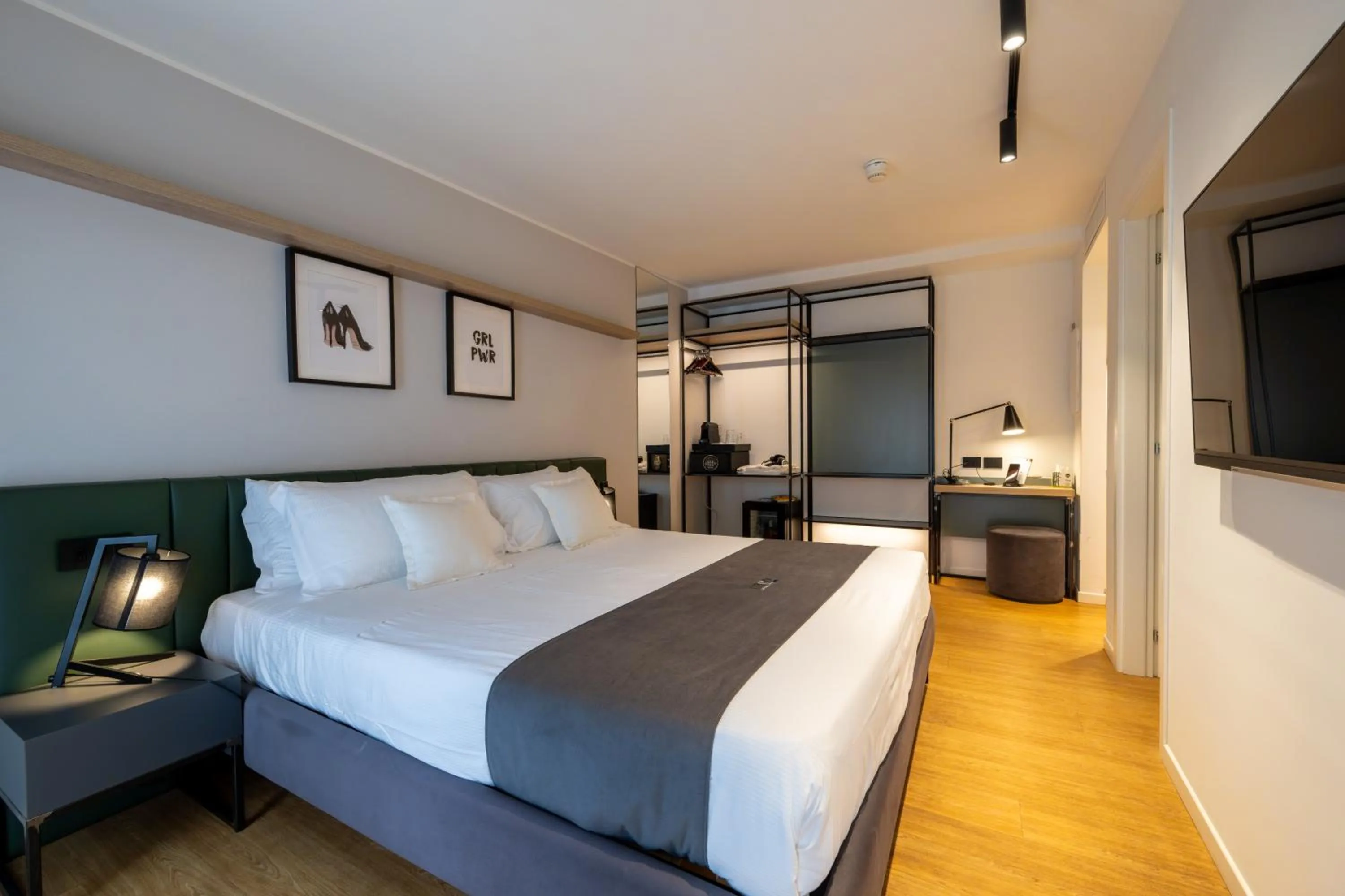 Bed in Meg Lifestyle Hotel & Apartaments