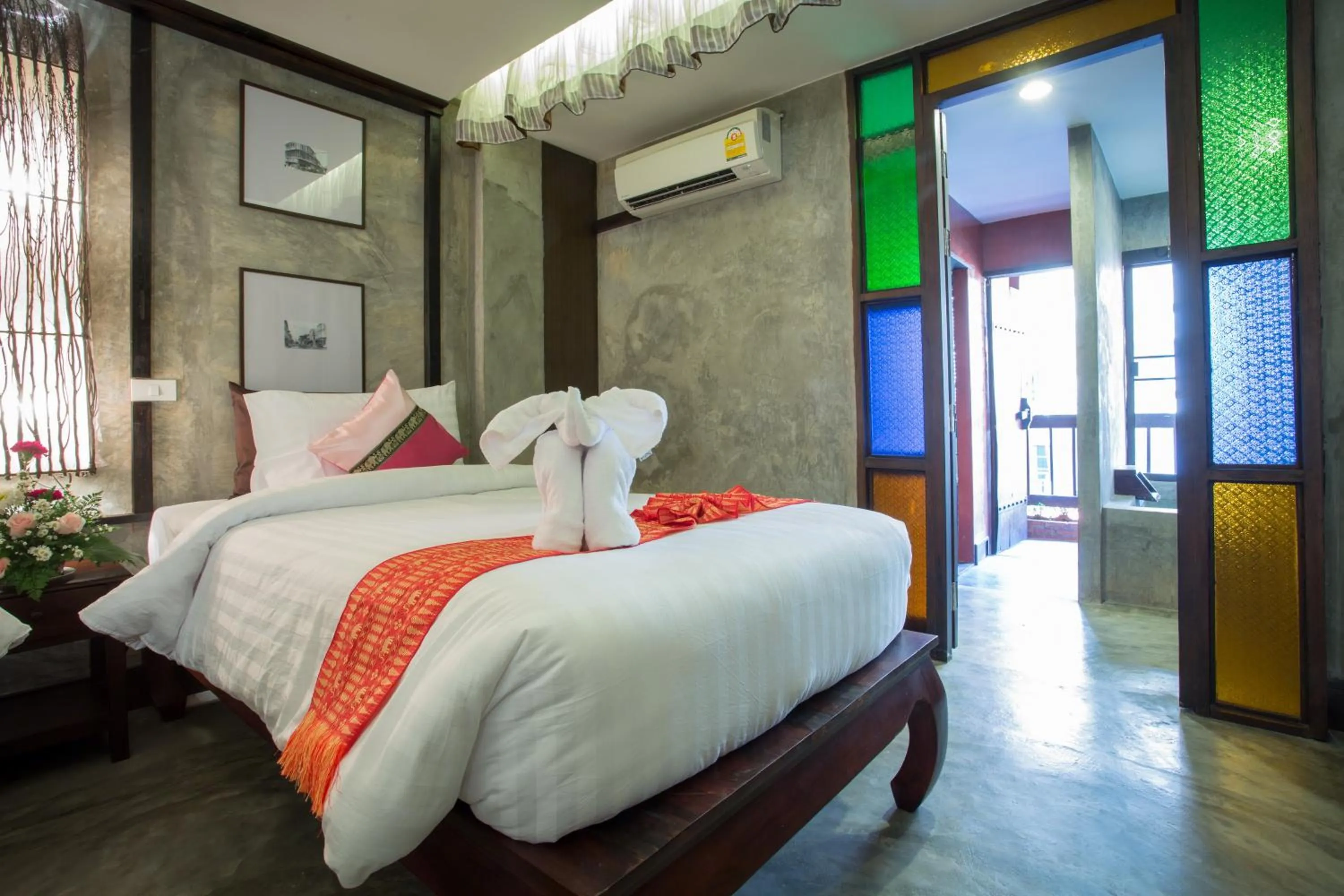 Bed in Rainforest ChiangMai Hotel