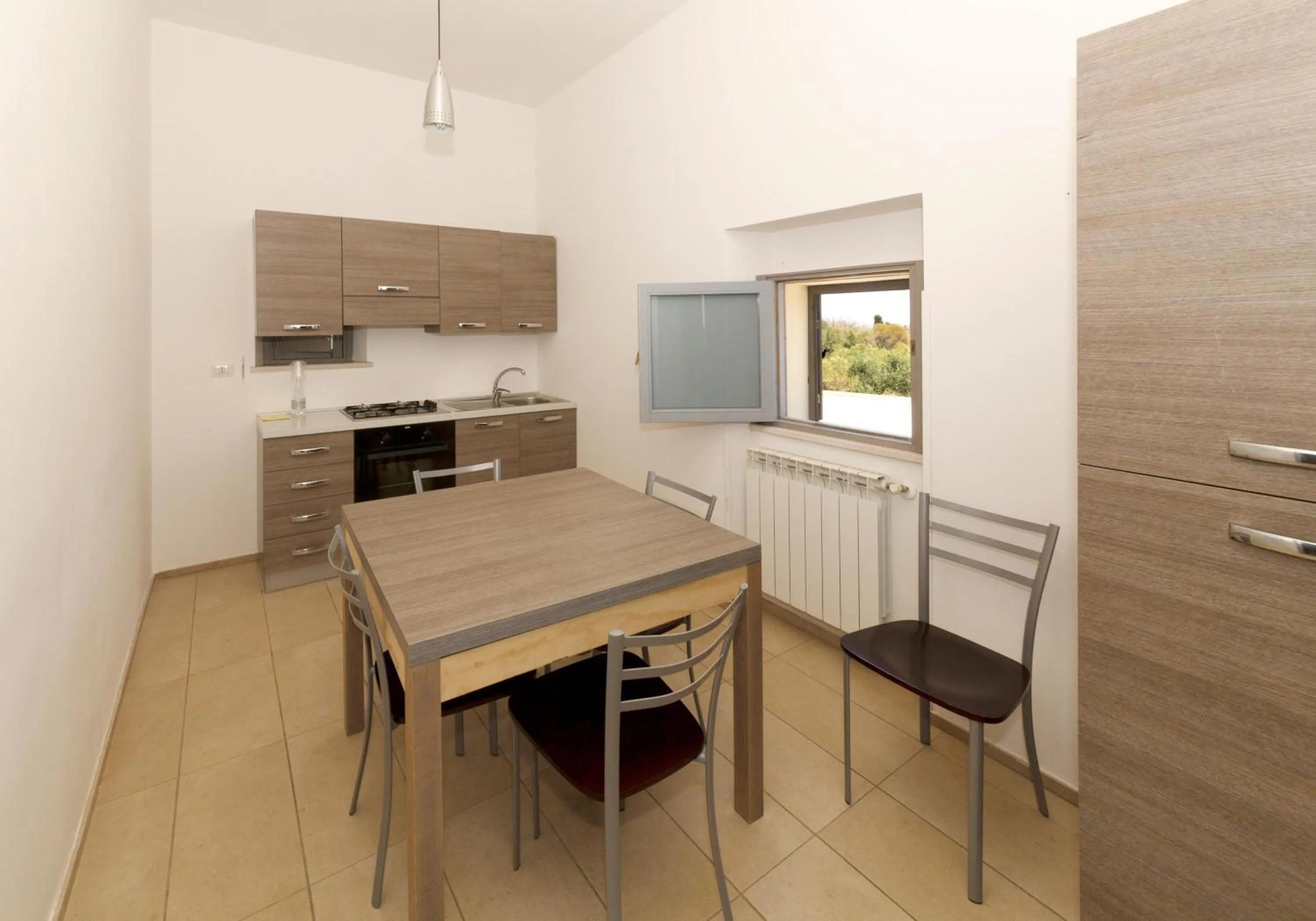 Kitchen or kitchenette in La Casa di Ora