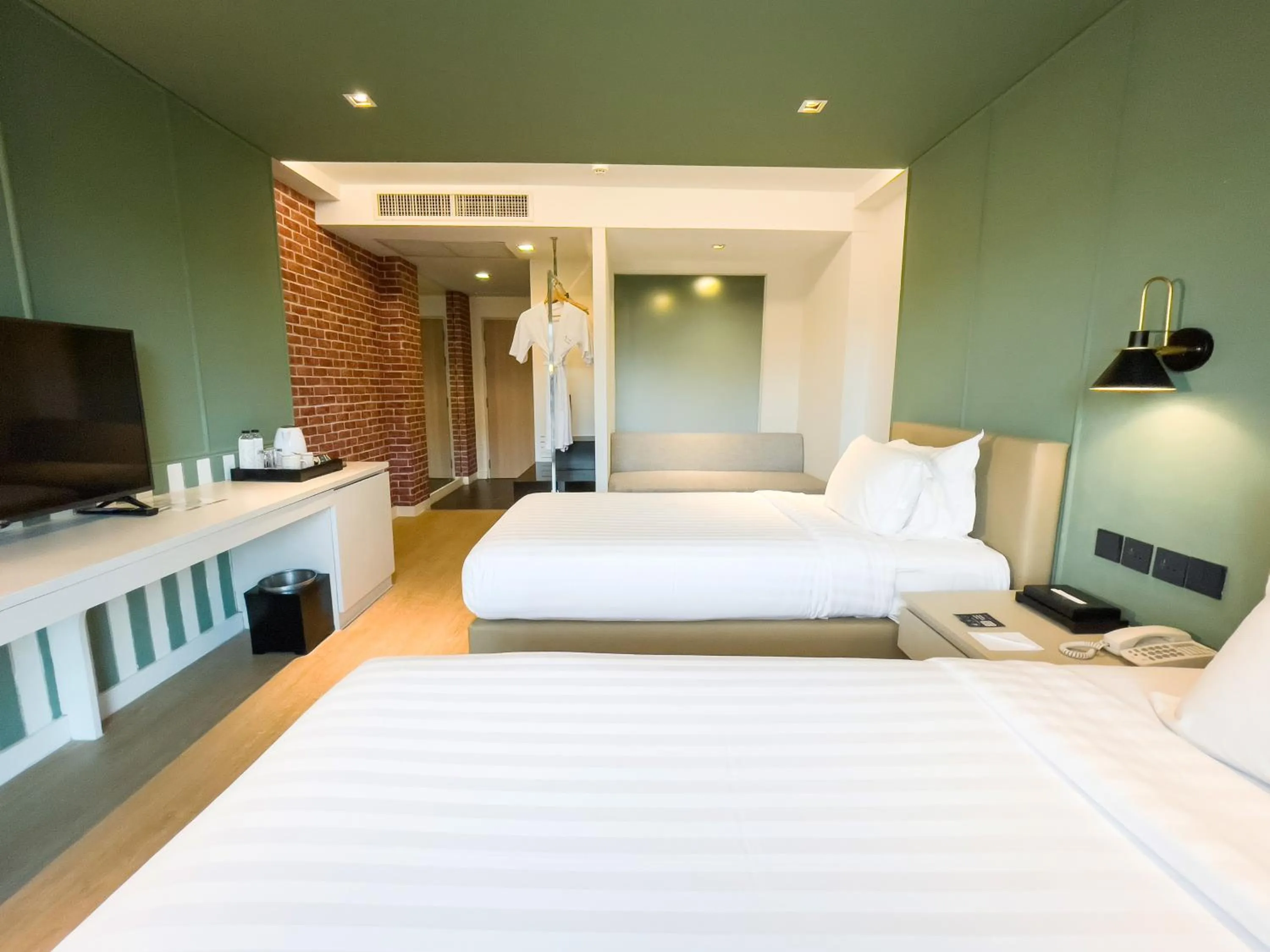Bed in Happihaus Hotel Bangkok