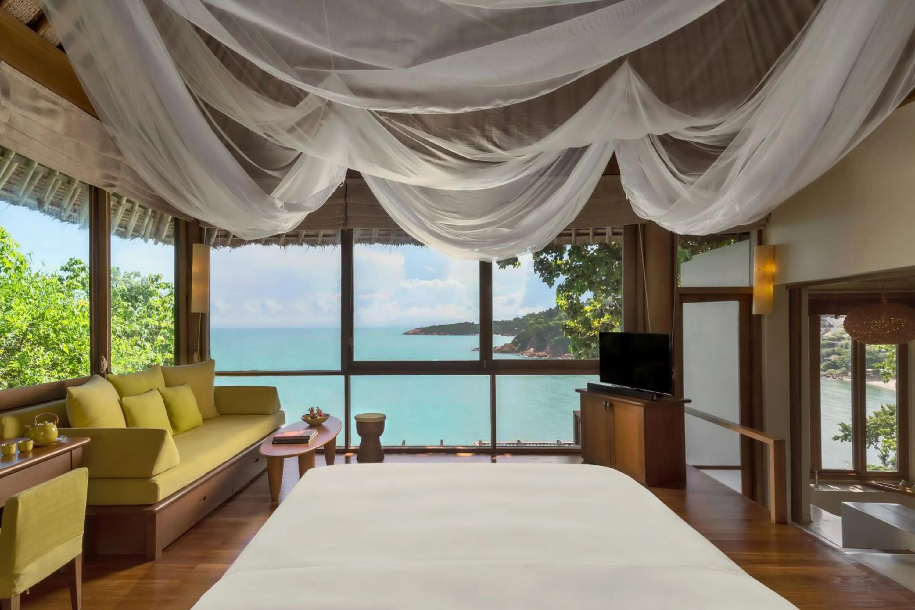 Property building, Bed in Six Senses Samui