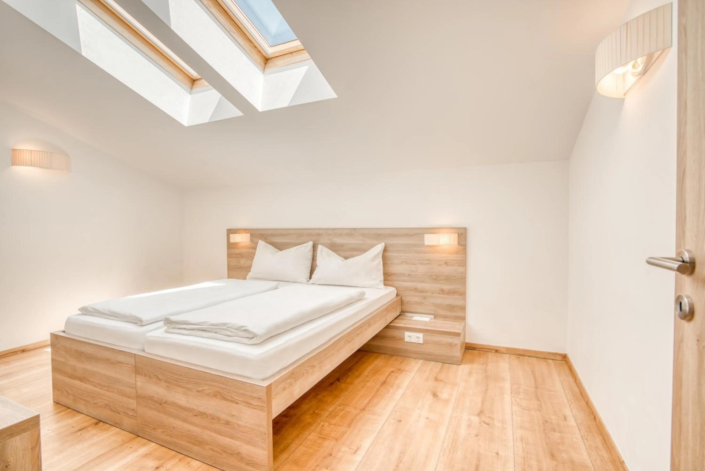 Photo of the whole room, Bed in COOEE alpin Hotel Kitzbüheler Alpen