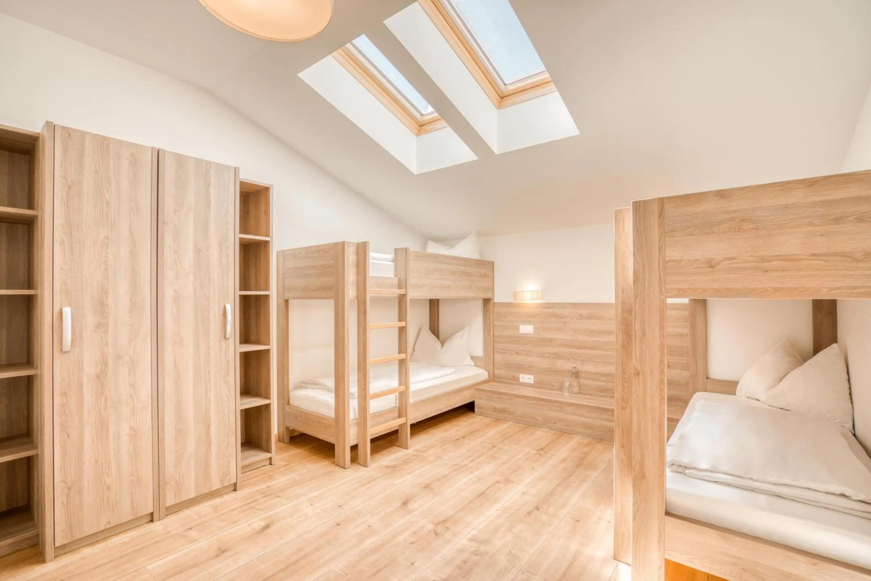 Bed in COOEE alpin Hotel Kitzbüheler Alpen