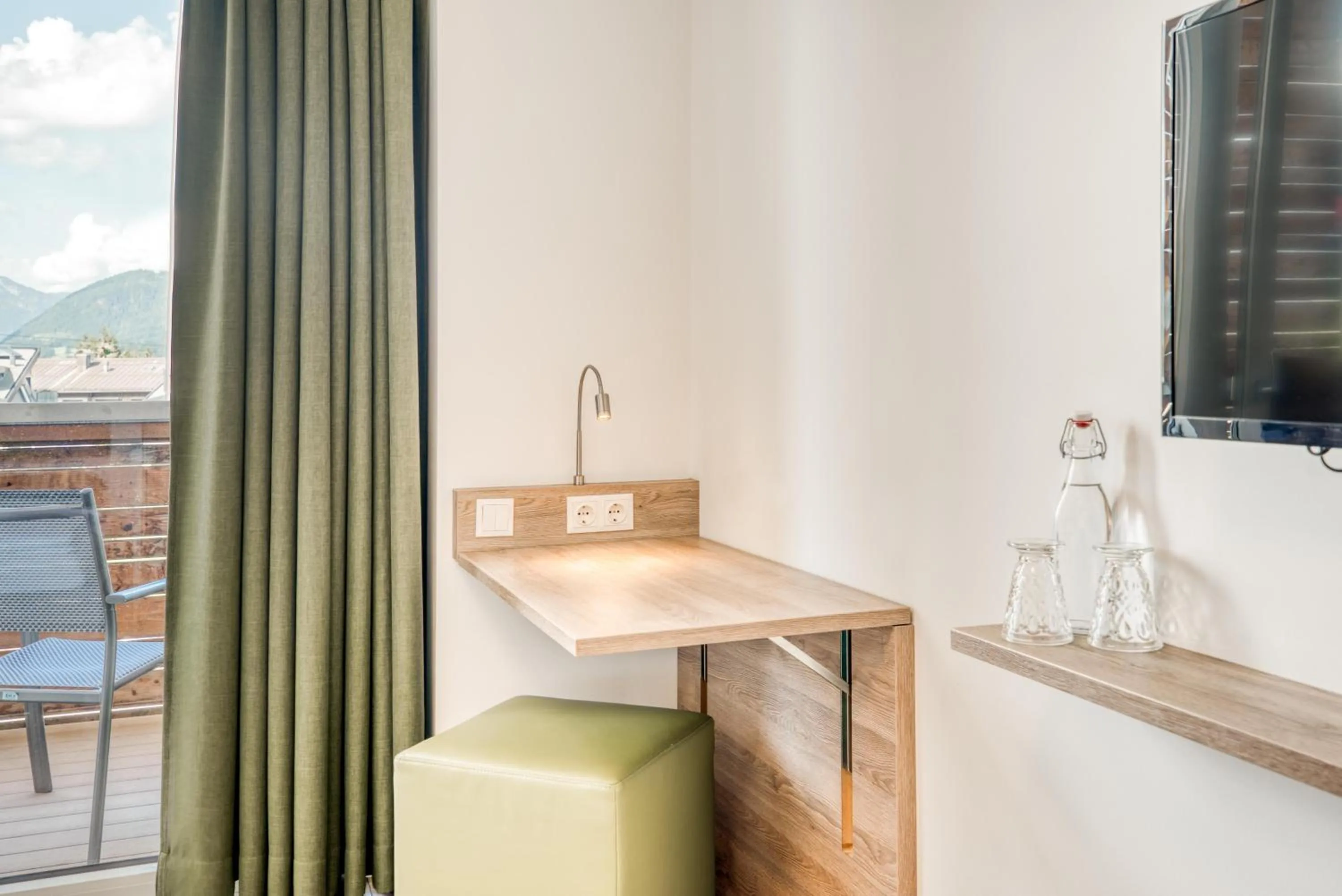 TV and multimedia in COOEE alpin Hotel Kitzbüheler Alpen