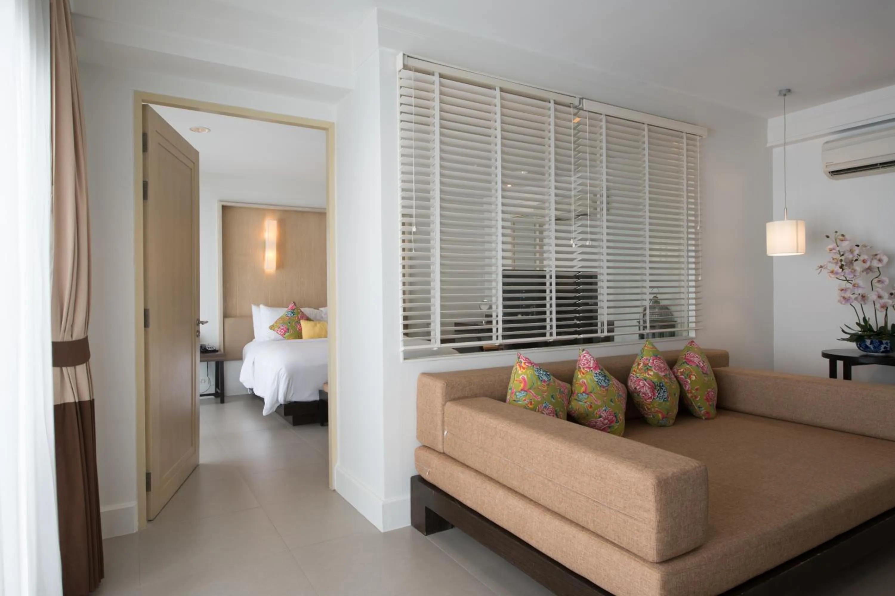 Seating area, Bed in Sawaddi Patong Resort & Spa by Tolani