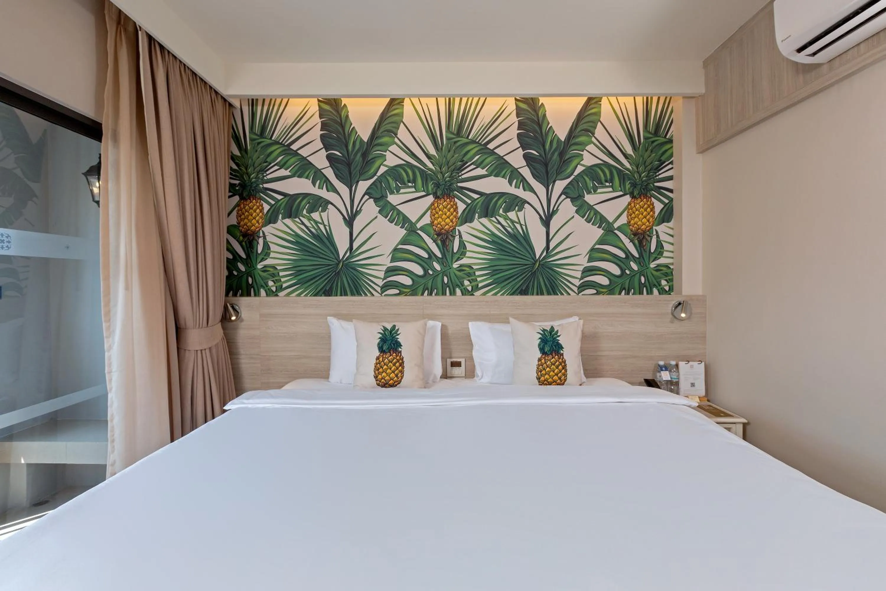 Bed in Sawaddi Patong Resort & Spa by Tolani
